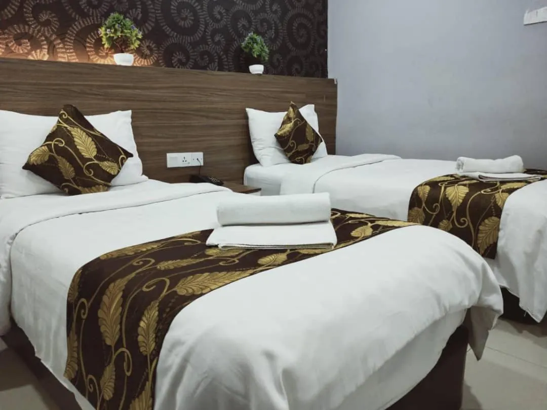 Bed in D'Metro Hotel