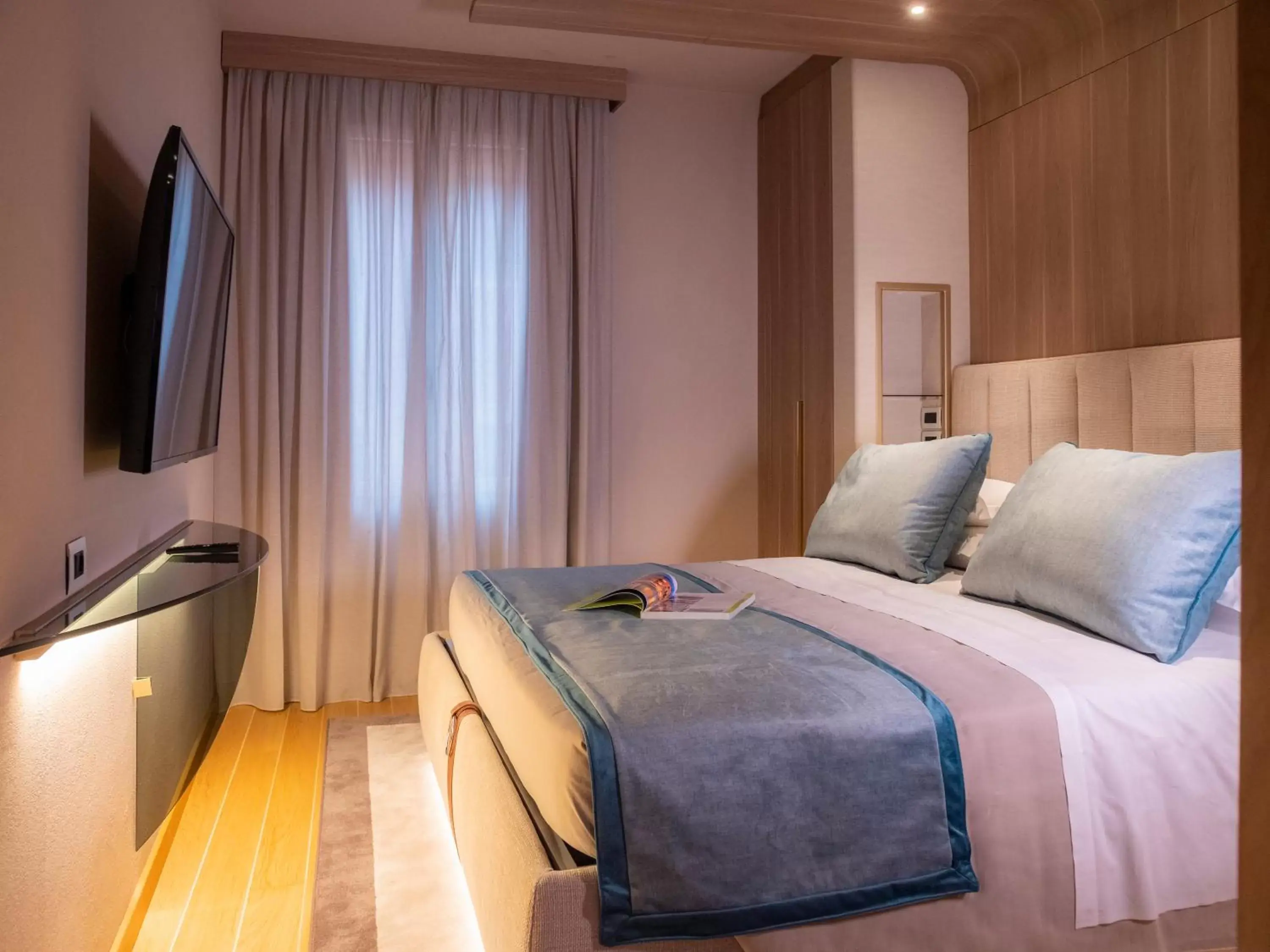 Bed in Miramare Suites