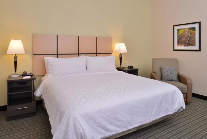 Bed in Candlewood Suites - Austin Airport, an IHG Hotel