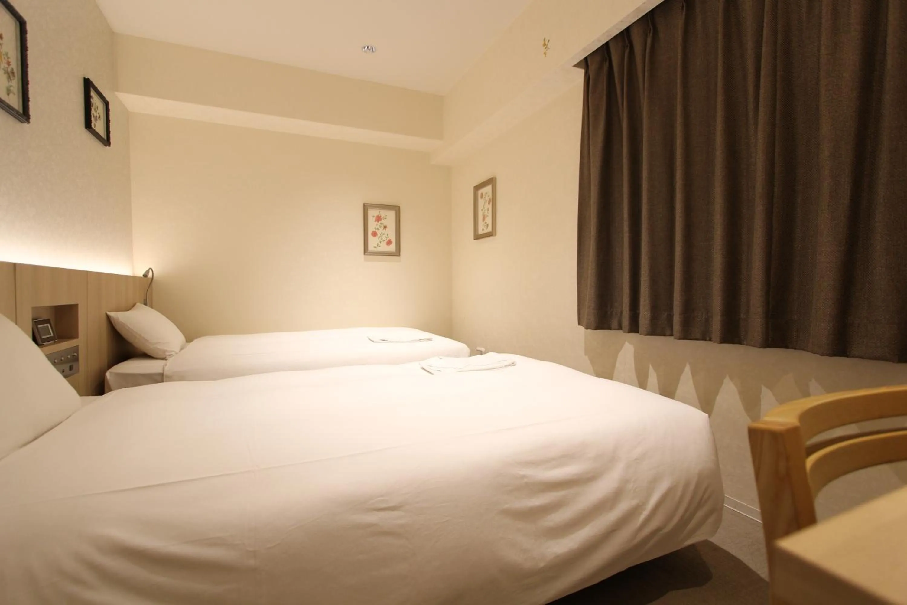 Bed in KOKO HOTEL Osaka Namba Ebisucho