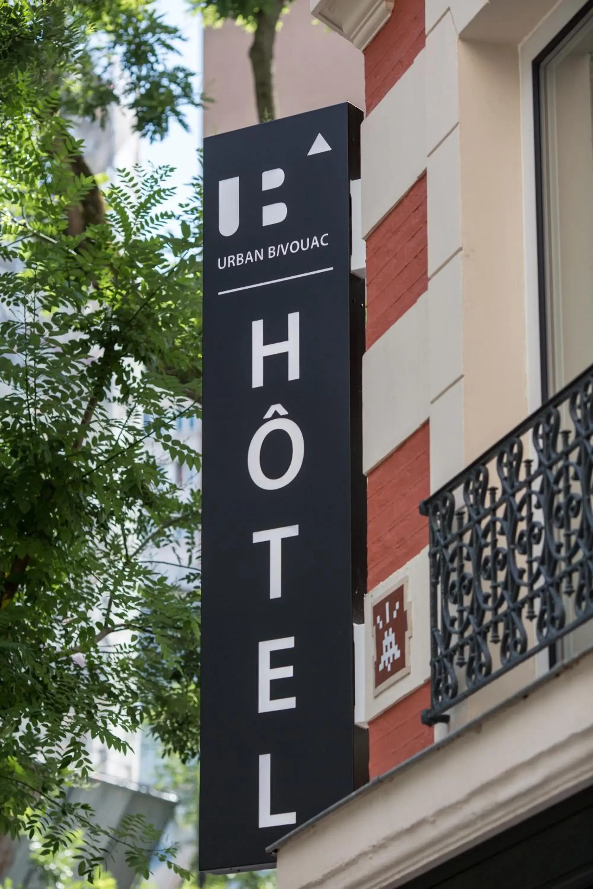 Property logo or sign in Urban Bivouac Hotel