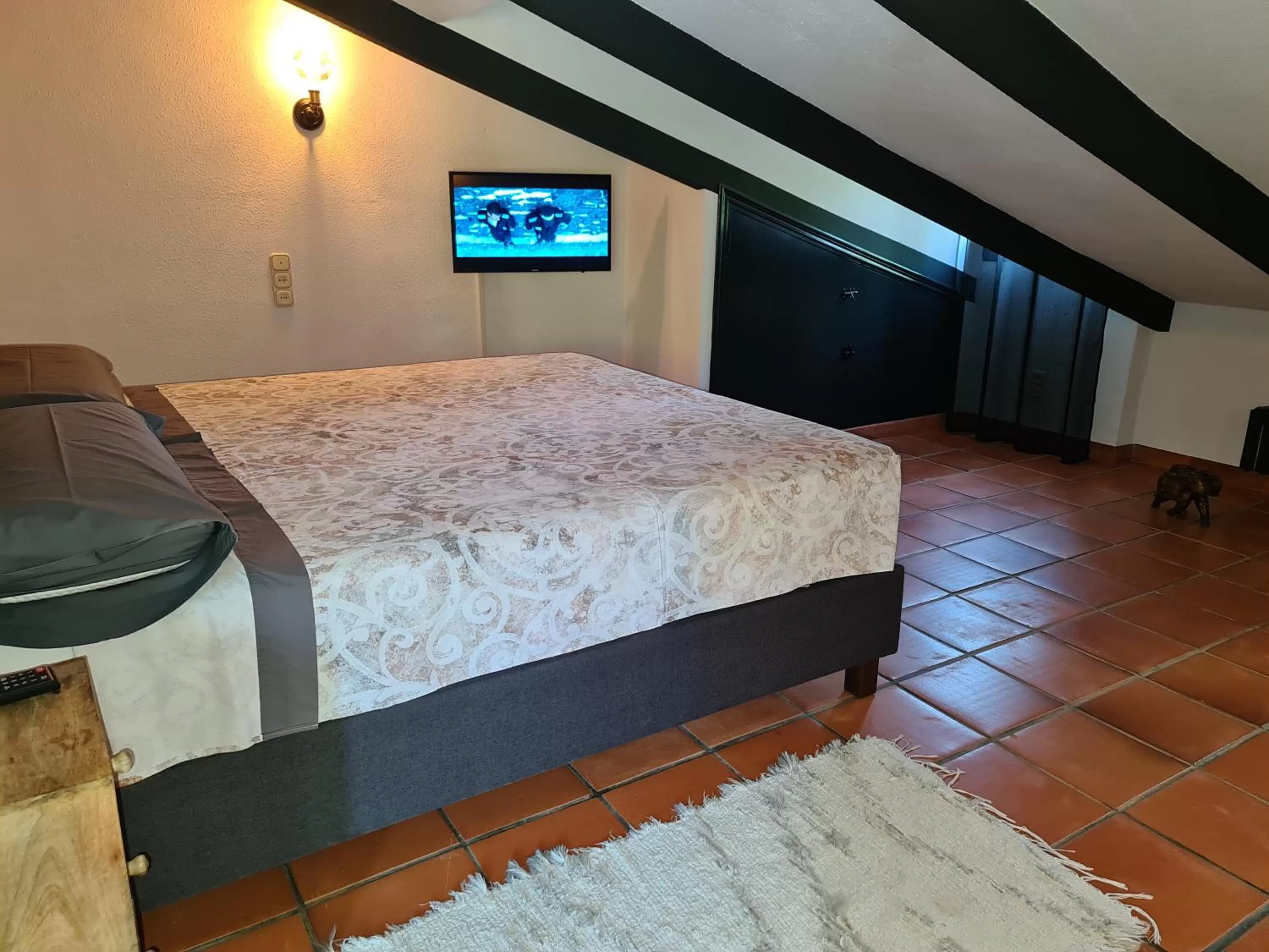 Communal lounge/ TV room, Bed in Finca la Yuca