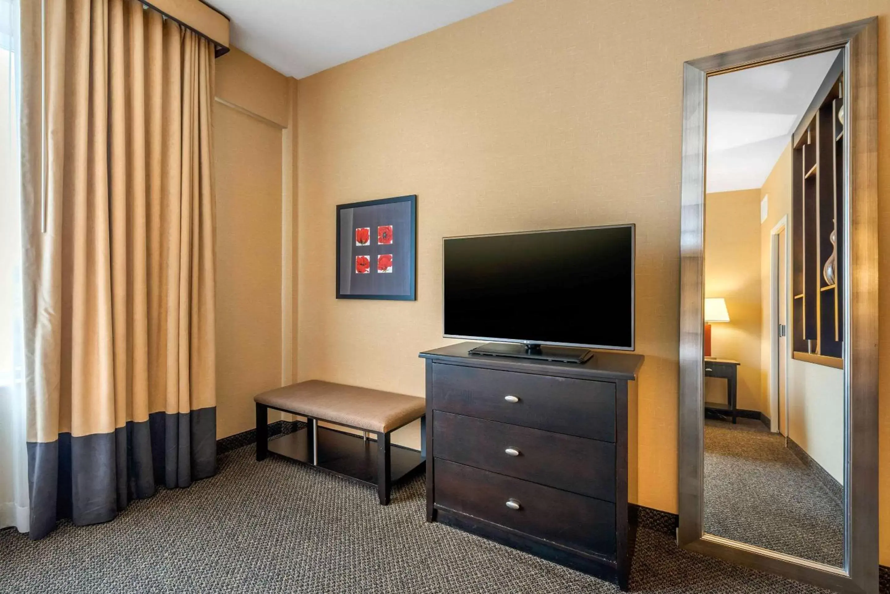 Photo of the whole room, TV/Entertainment Center in Cambria Hotel Akron - Canton Airport