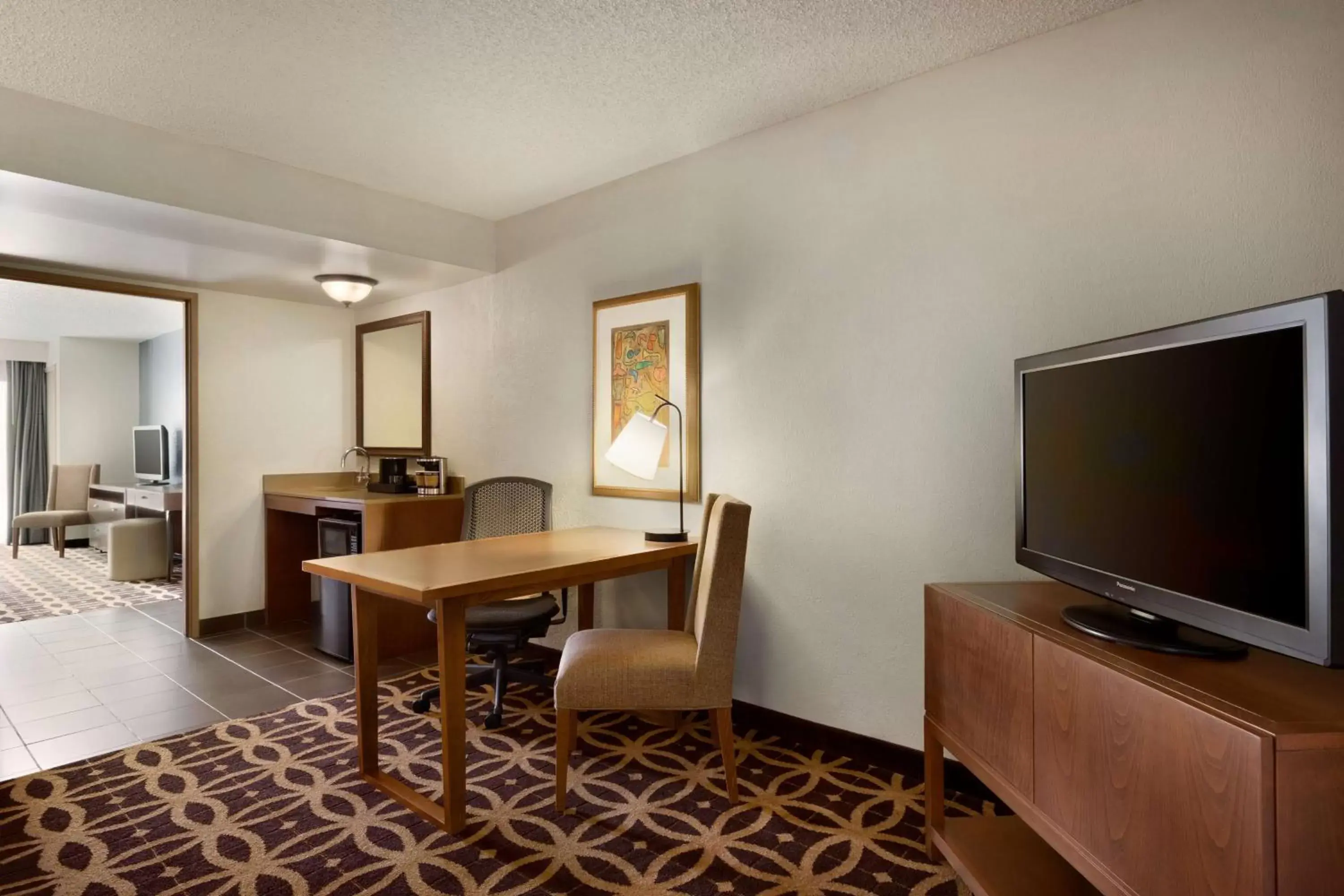 Bed, TV/Entertainment Center in Embassy Suites Dallas - DFW International Airport South