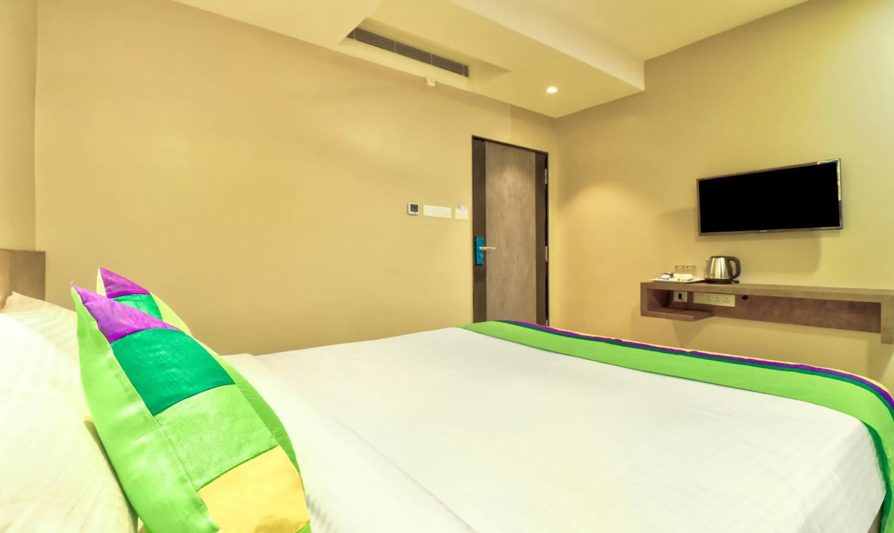 Bedroom, Bed in Treebo Sriz Cozy Seethamadhara Bedroom, Bed in Treebo Sriz Cozy Seethamadhara