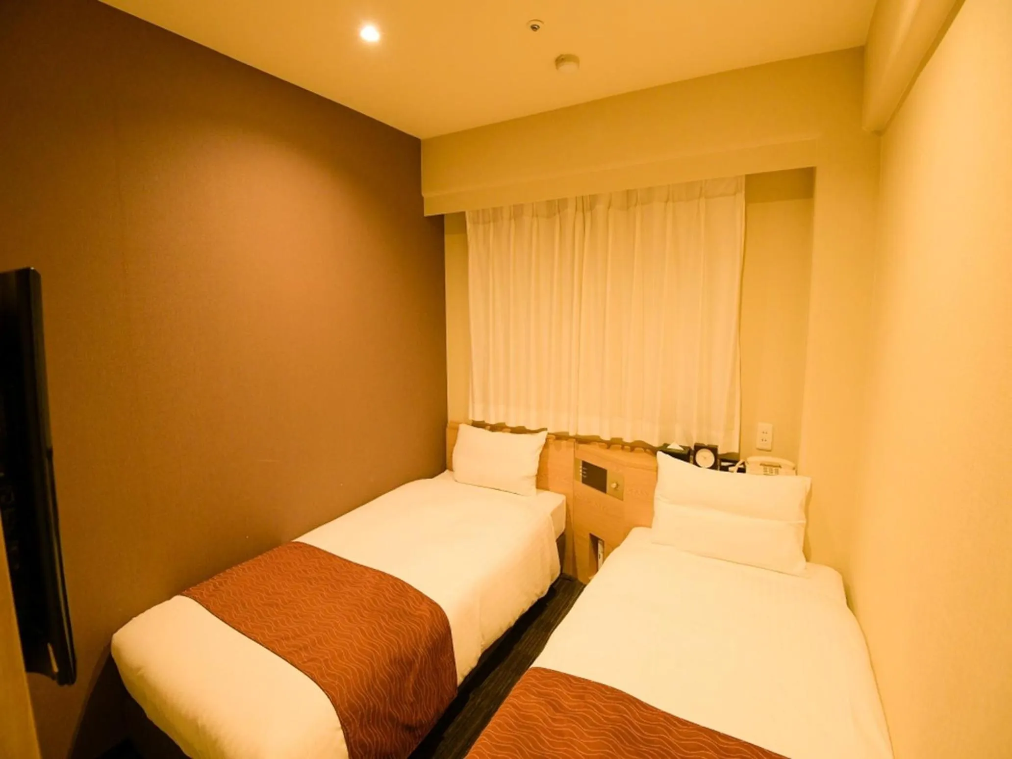 Bed in Via Inn Shin Osaka West