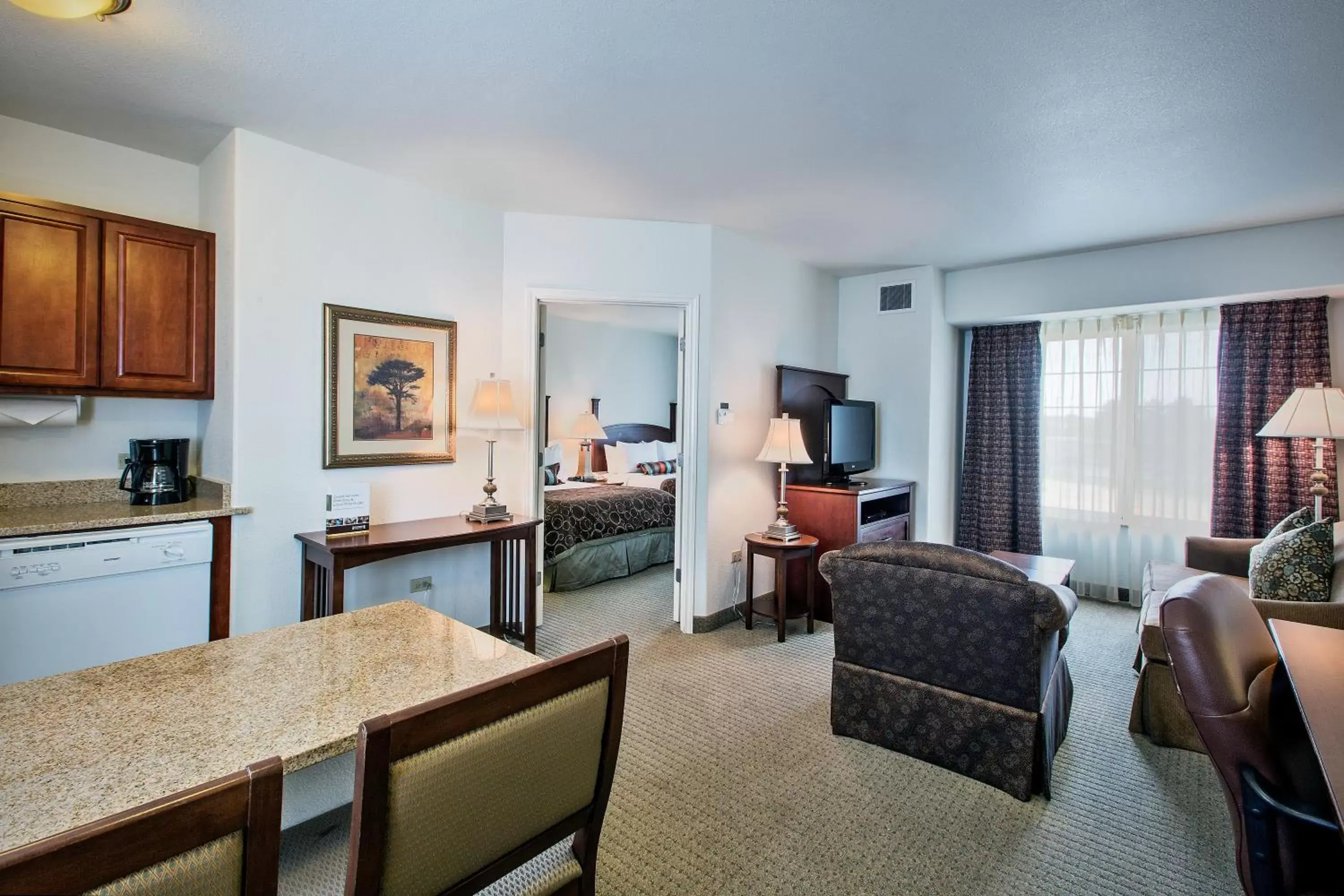 Photo of the whole room, Seating Area in Staybridge Suites Rockford, an IHG Hotel