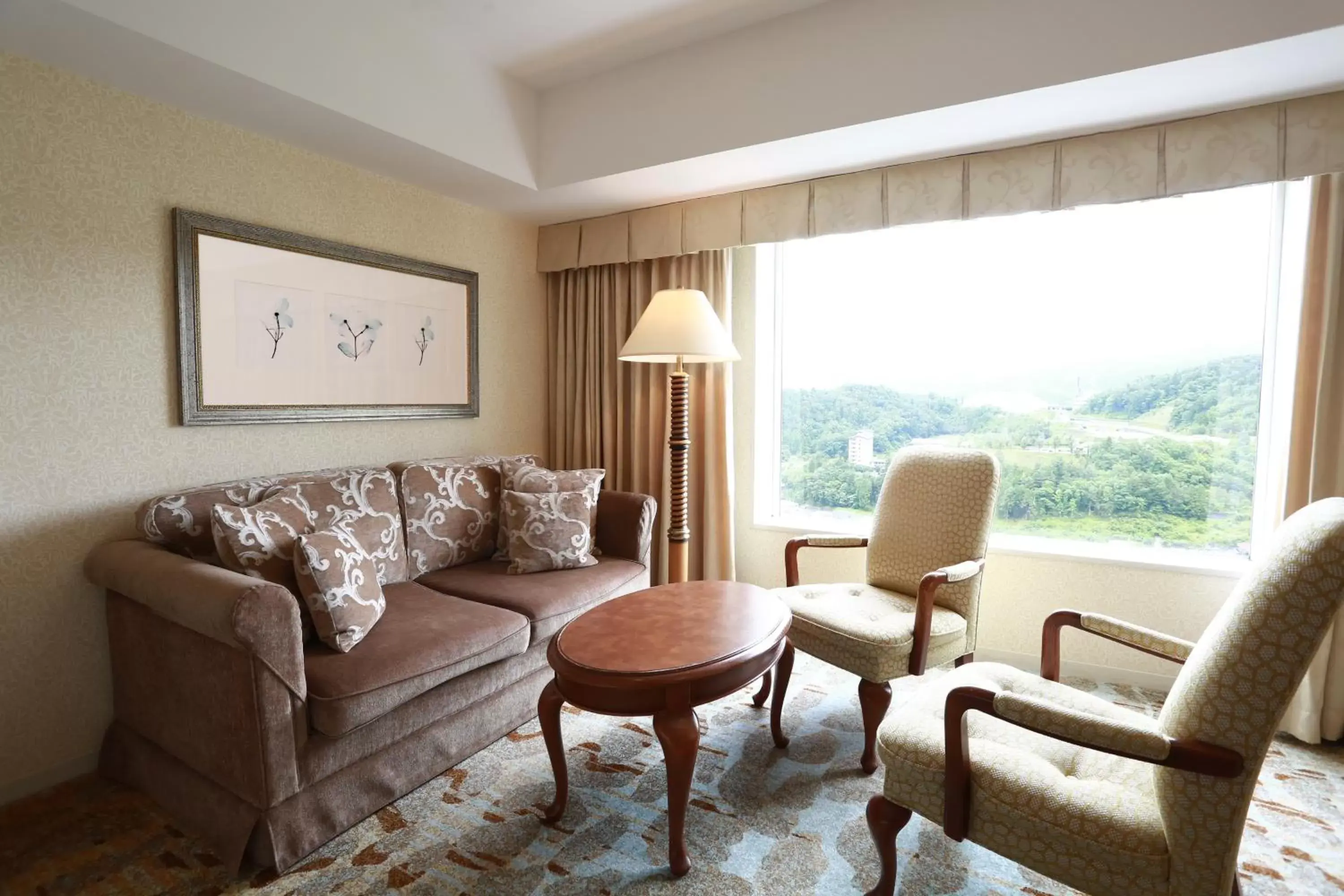 Photo of the whole room, Seating Area in Hotel Associa Takayama Resort