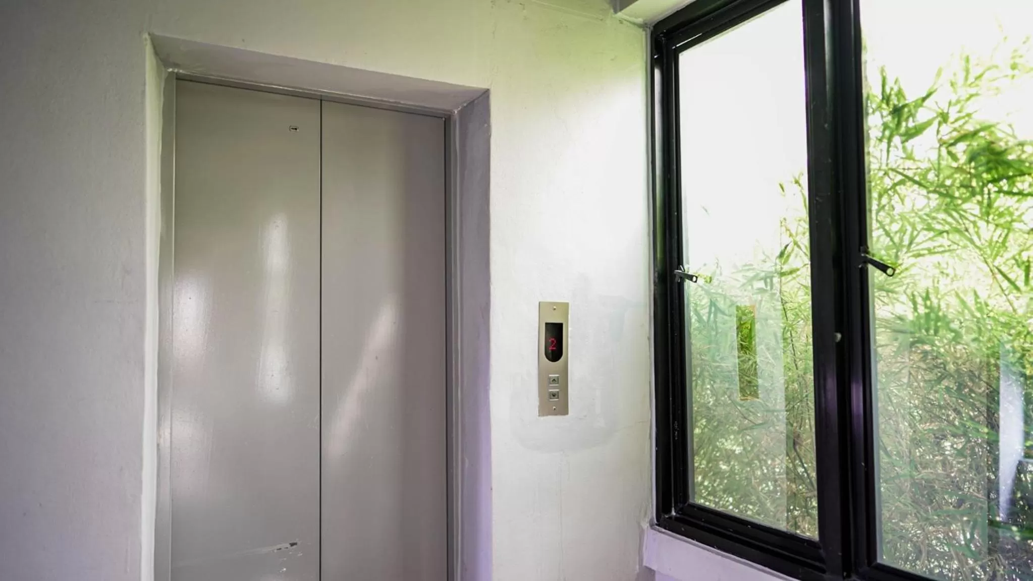 Property building in RoomQuest Bangkok Don Mueang Airport