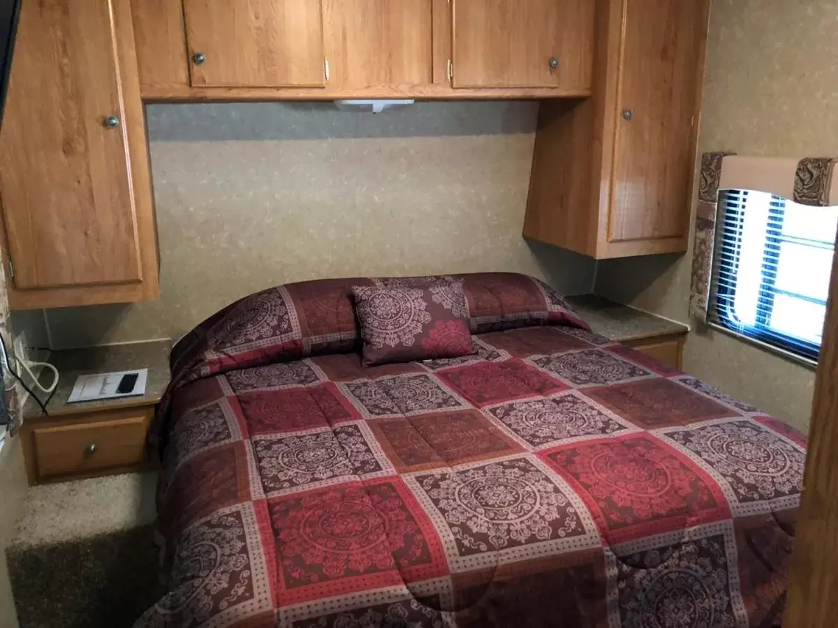 Bed in Cindy’s Motel & RV Park