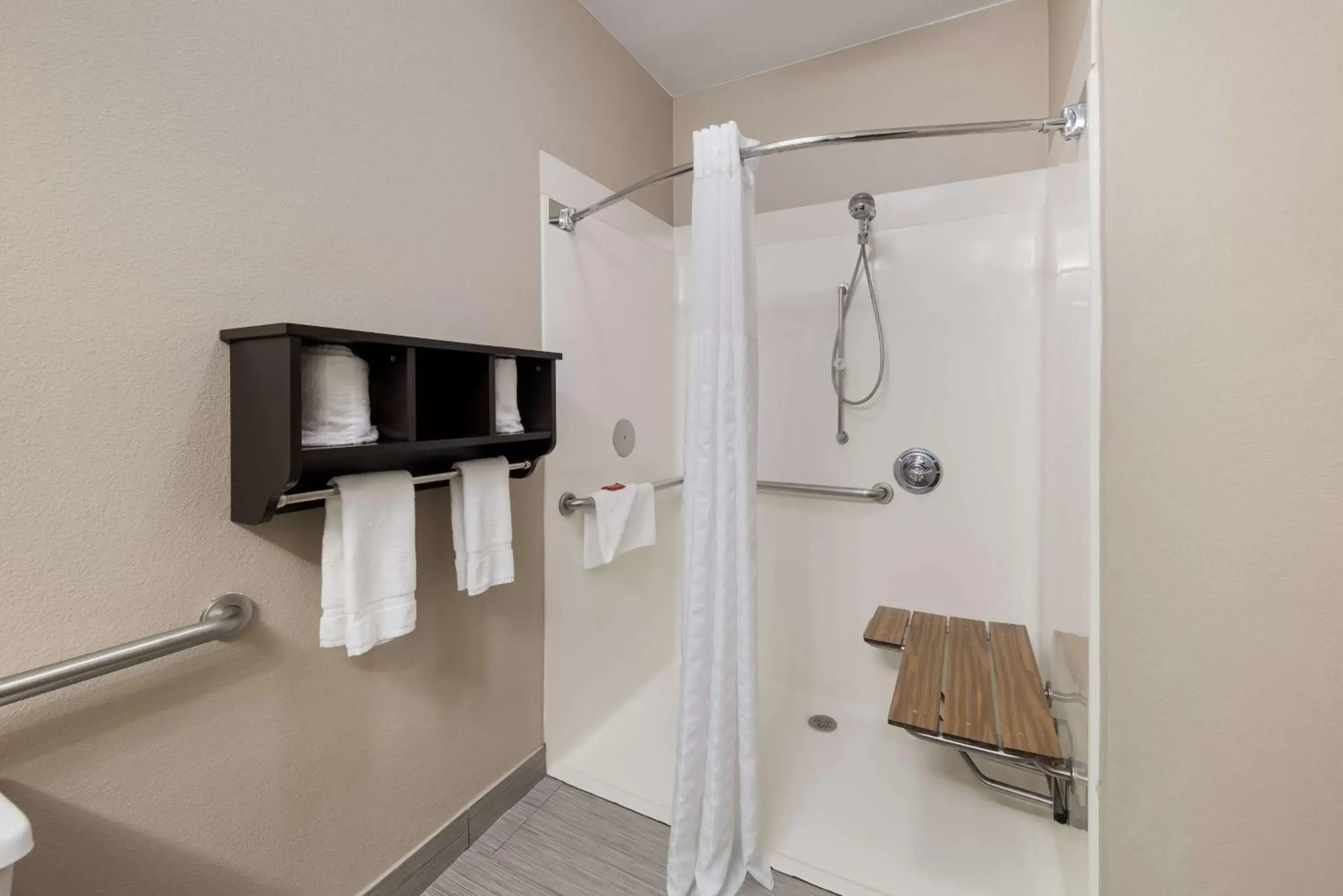 Bathroom in SureStay Plus Hotel by Best Western Plano