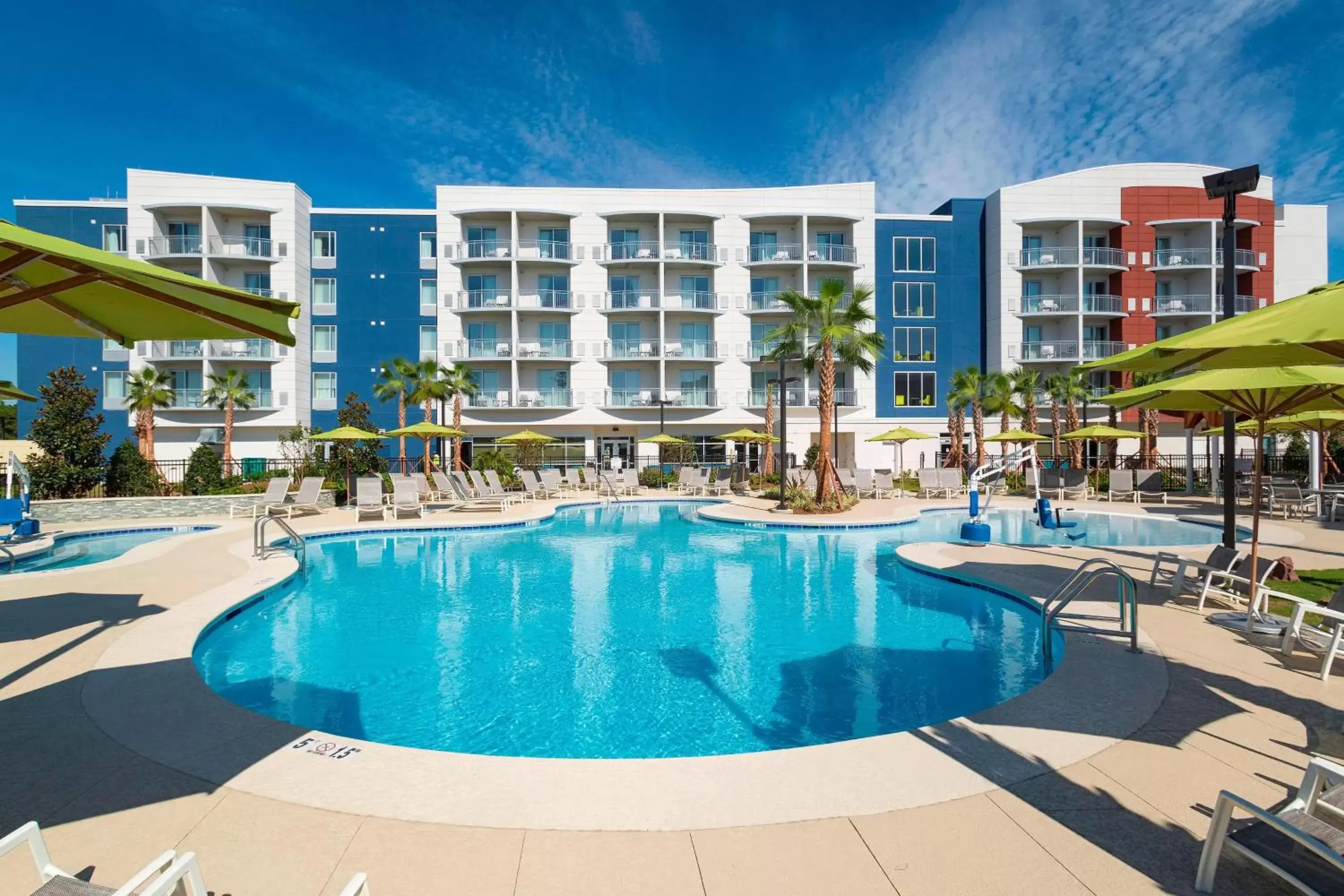 Swimming pool, Property Building in SpringHill Suites Orange Beach at The Wharf
