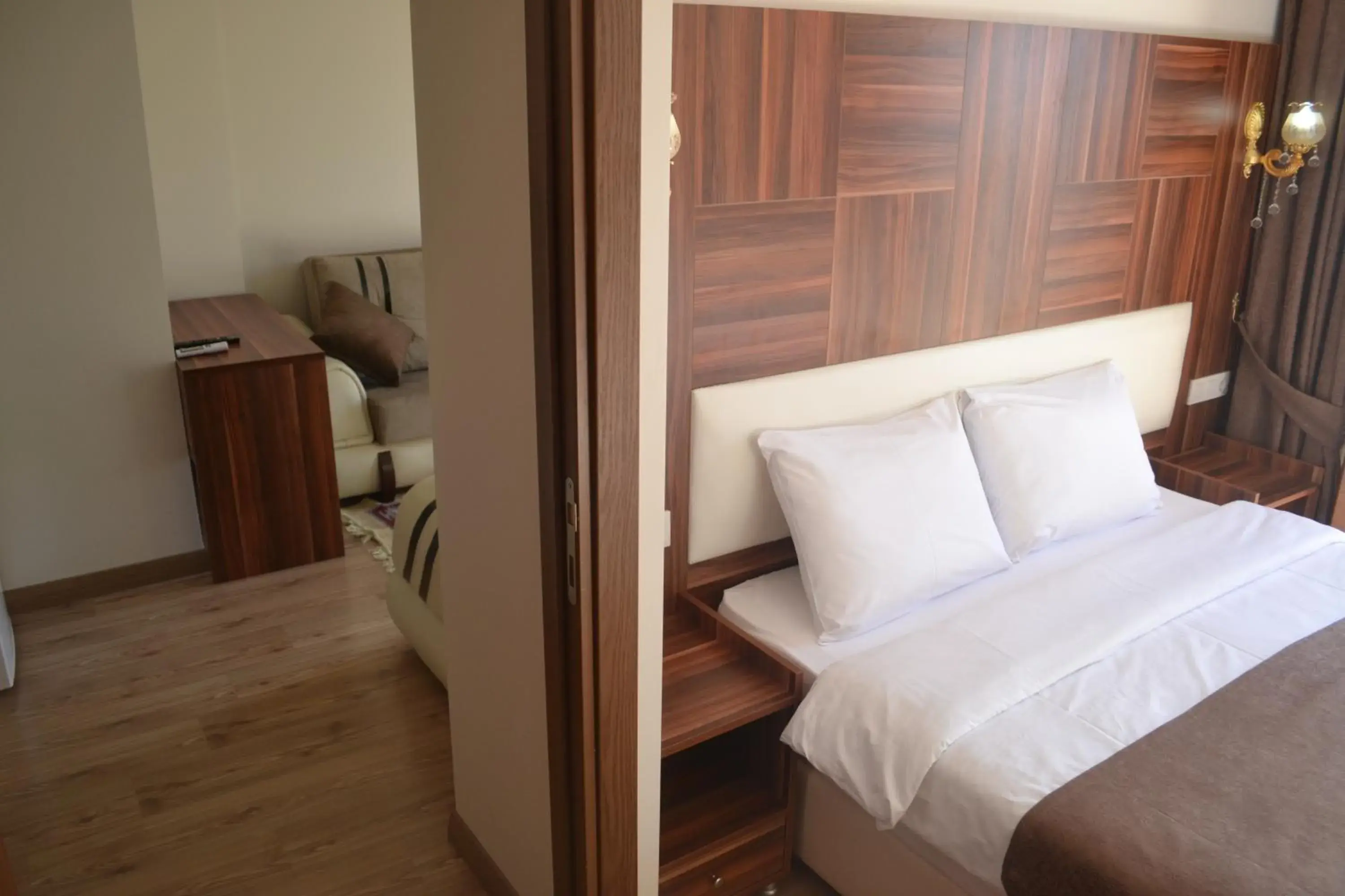 Living room, Bed in New Fatih Hotel
