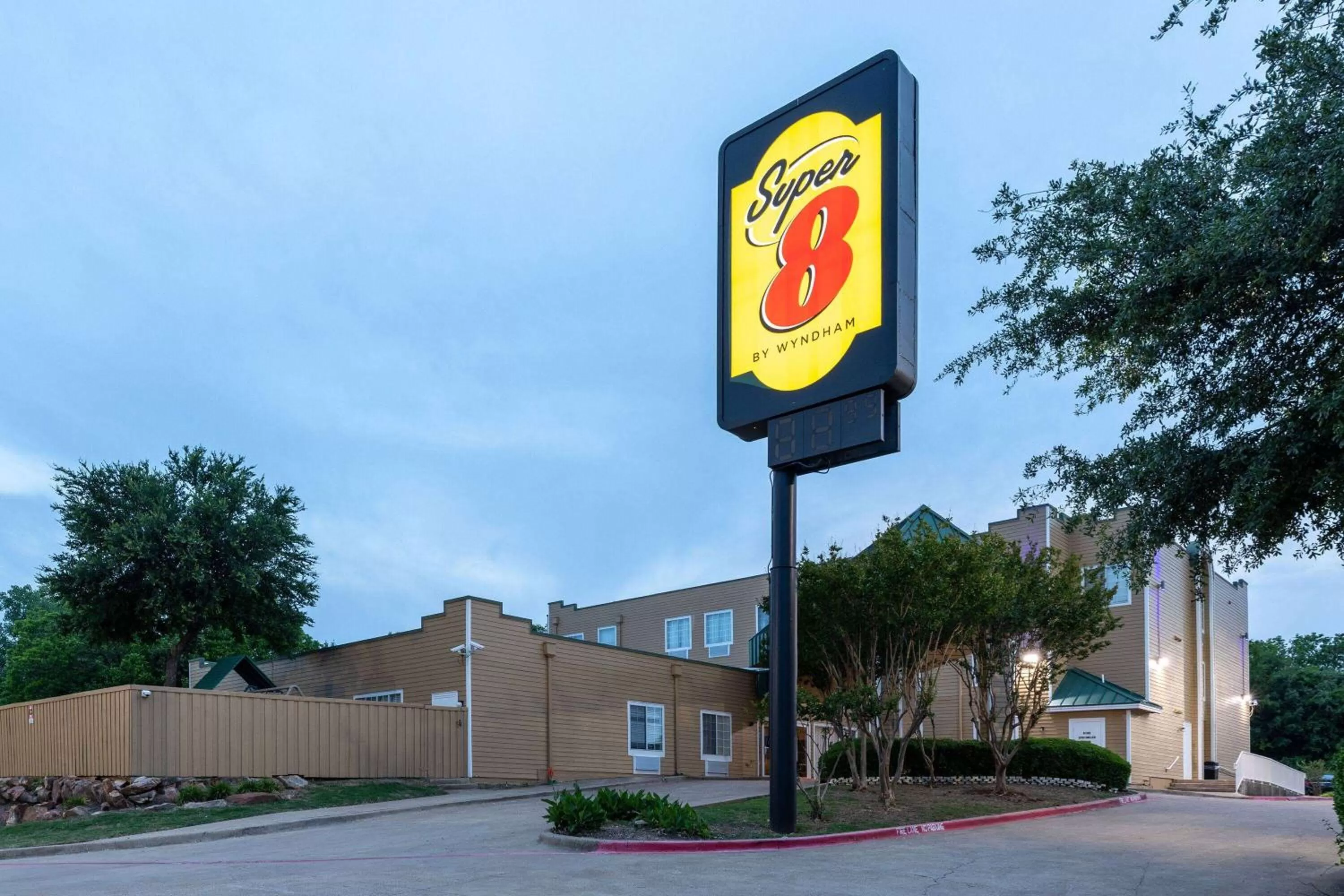 Property building in Super 8 by Wyndham Garland Rowlett East Dallas Area