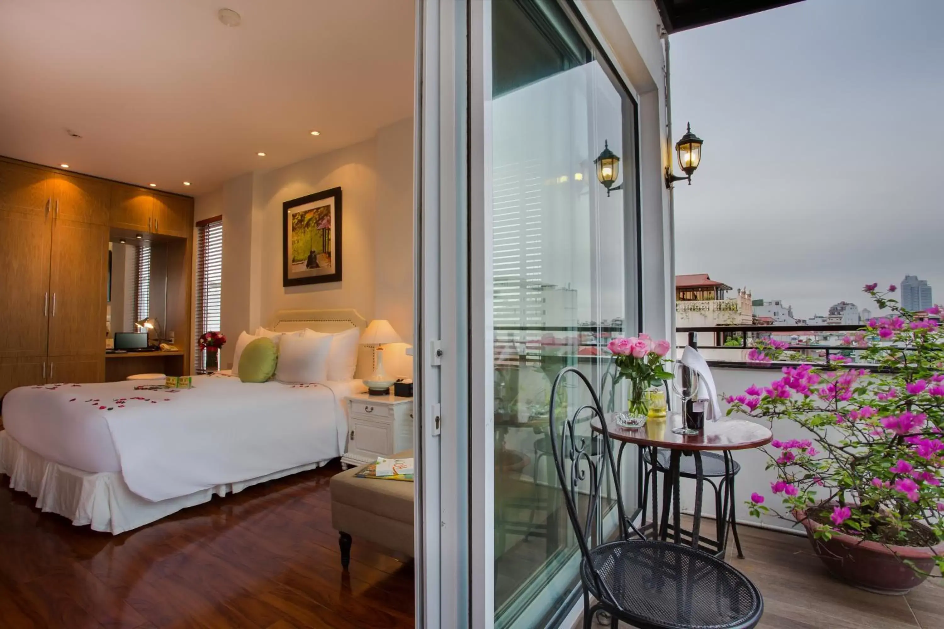 Balcony/Terrace, Bed in Mercury Central Hotel Hanoi Balcony/Terrace, Bed in Mercury Central Hotel Hanoi