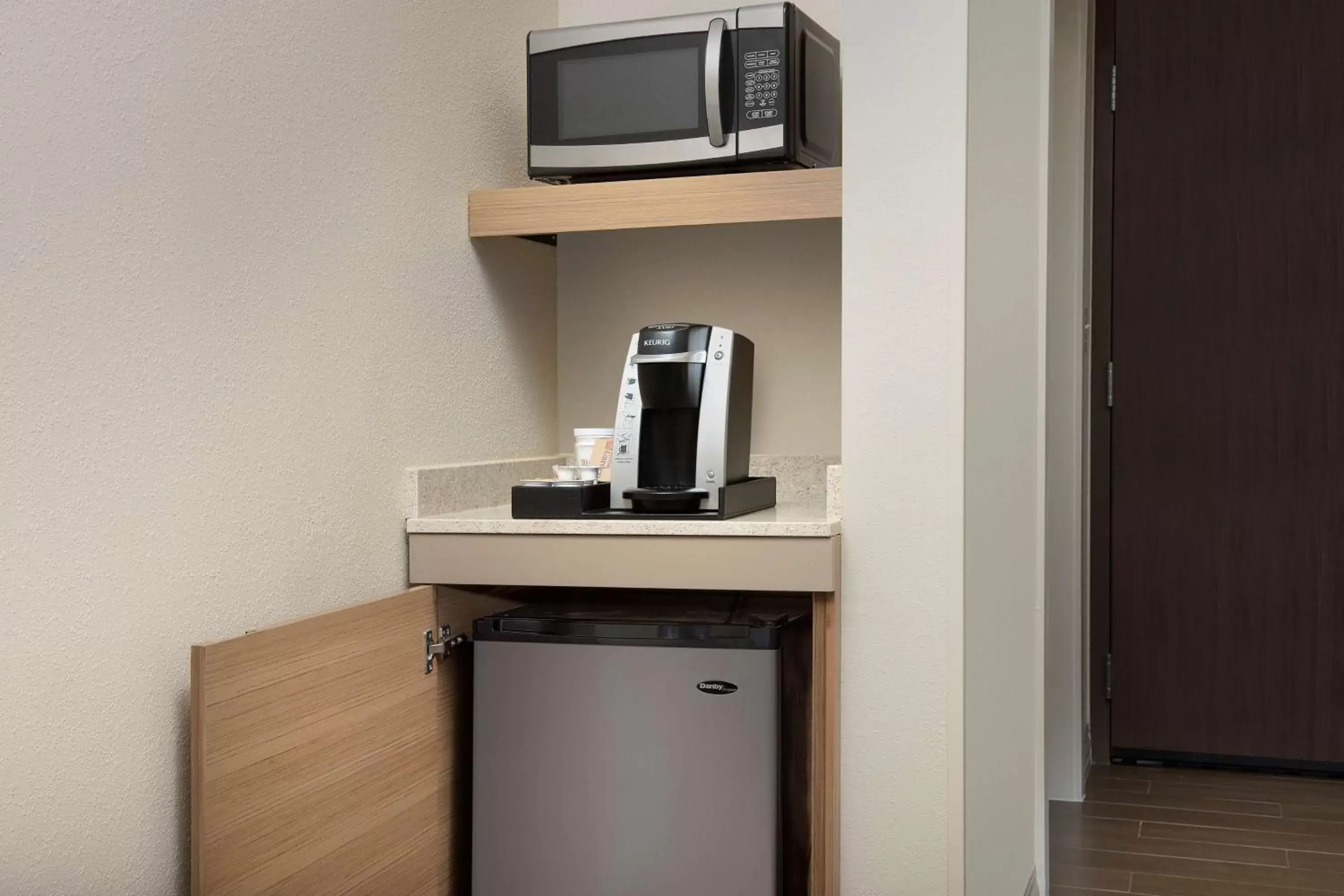 Photo of the whole room, TV/Entertainment Center in Hilton Garden Inn Charlotte Airport