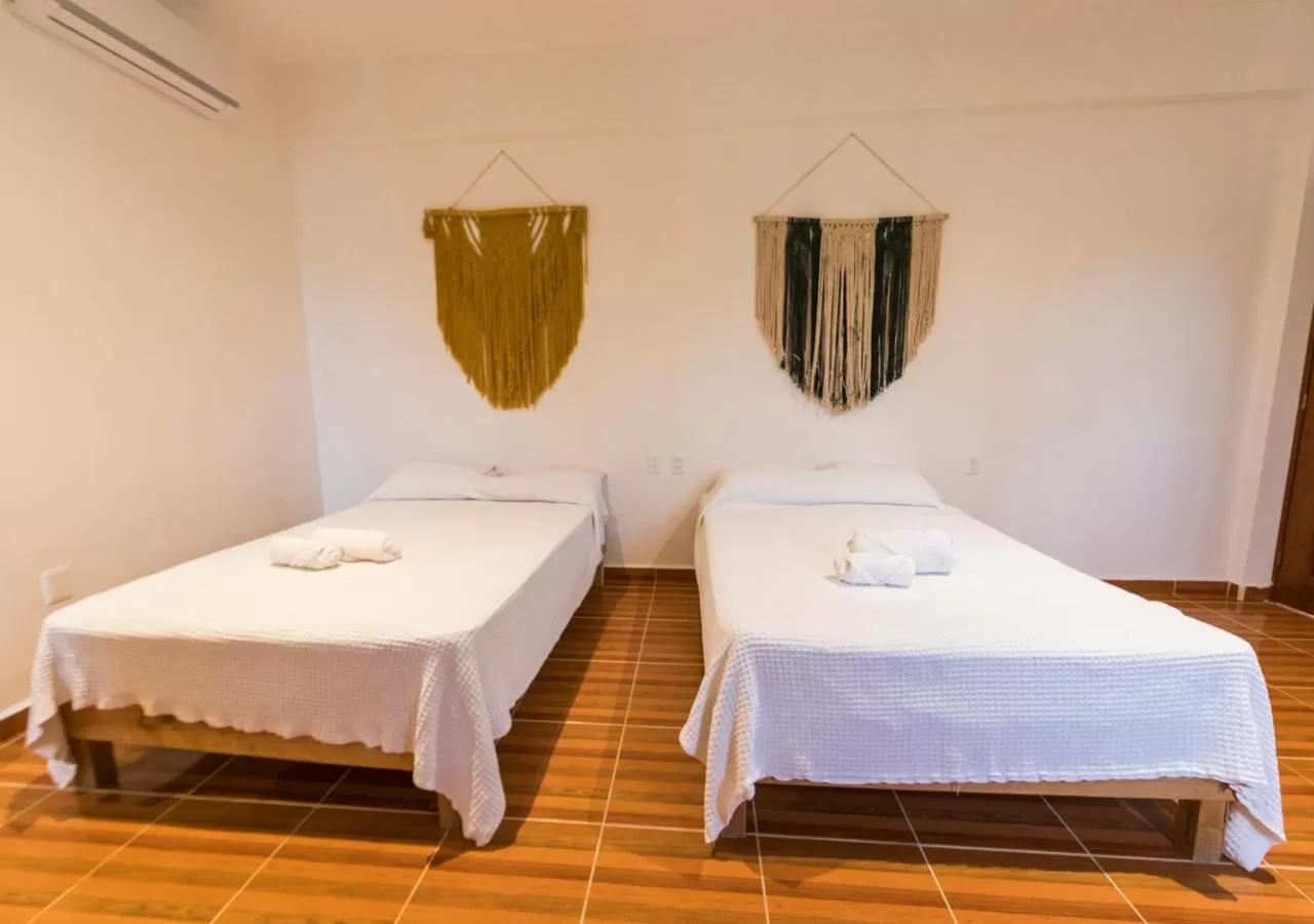 Bed in Itza La Veleta Tulum