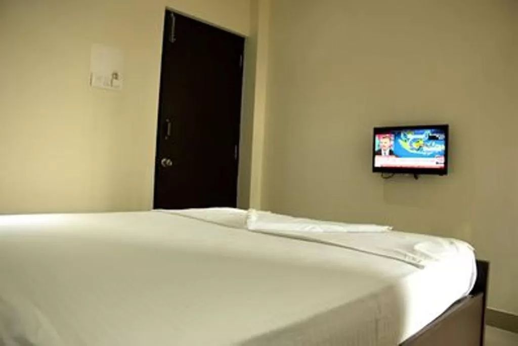 Bed in Star MSR Residency