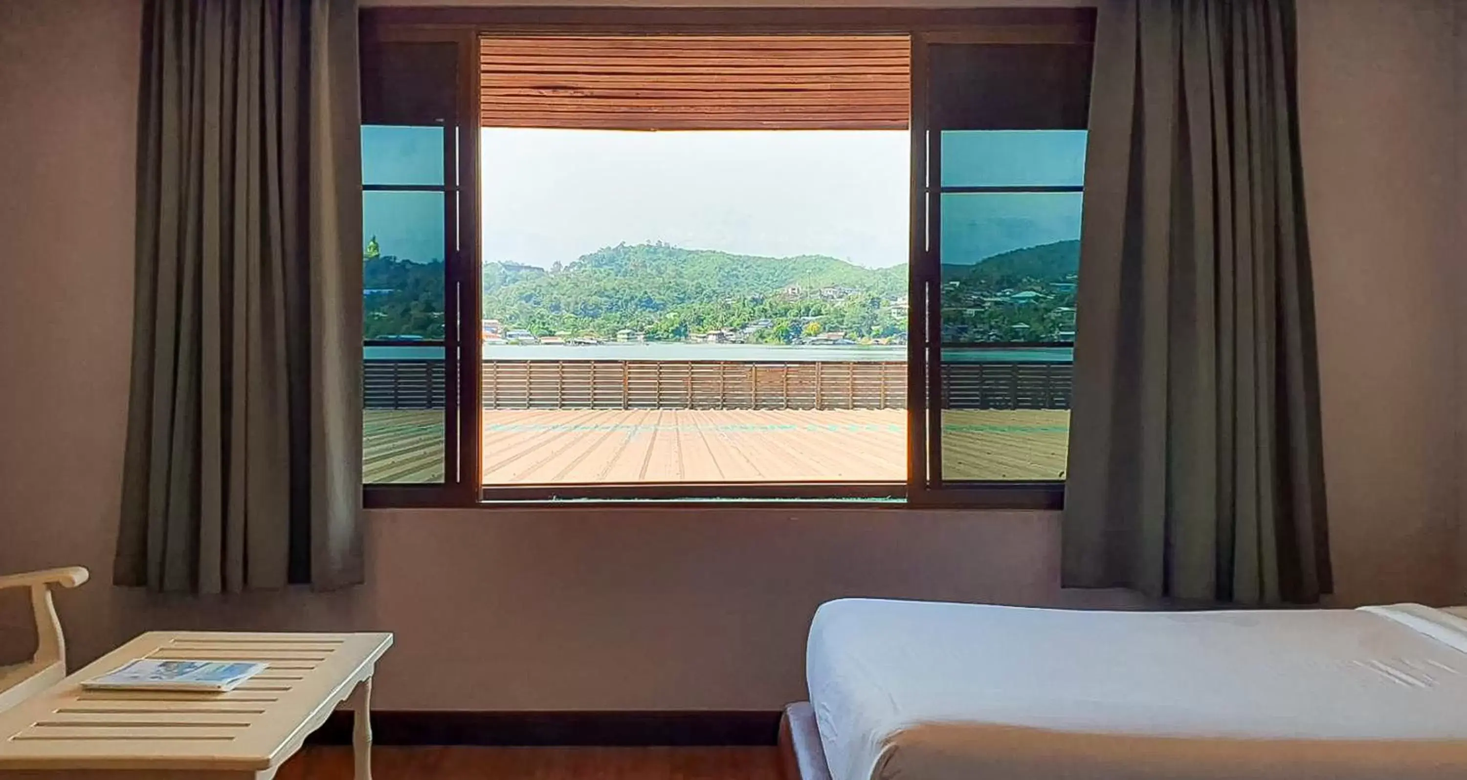 Bedroom, Mountain View in Phornpailin Riverside Resort