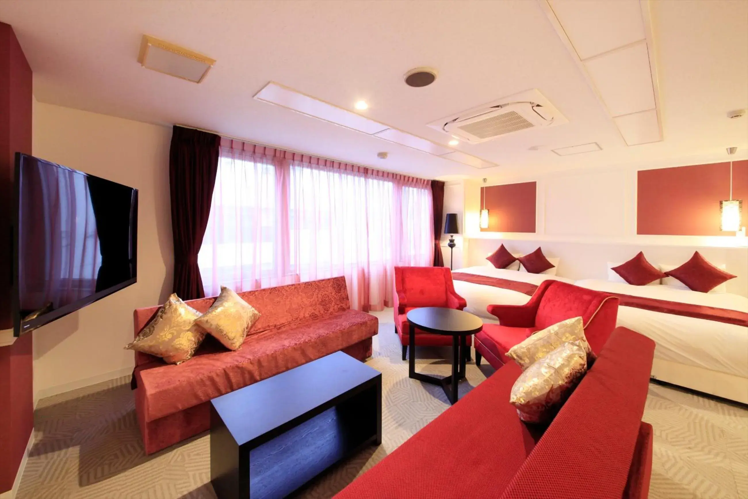 Photo of the whole room, Seating Area in Centurion Hotel Villa Suite Fukui Station