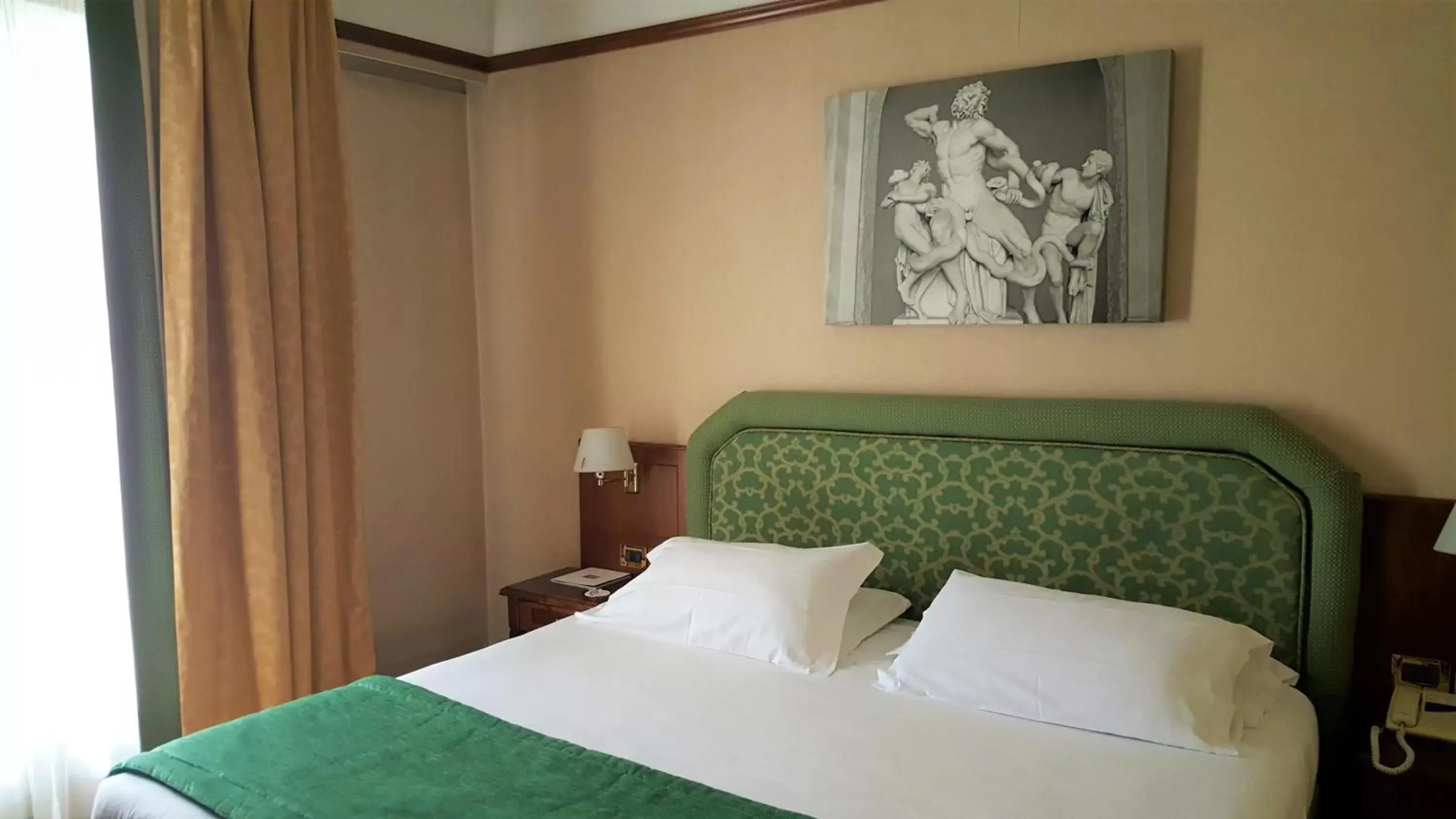 Photo of the whole room, Bed in iH Hotels Roma Cicerone