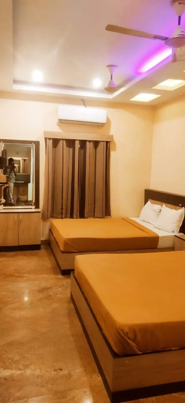 Photo of the whole room, Bed in SREE Kumaran Residence