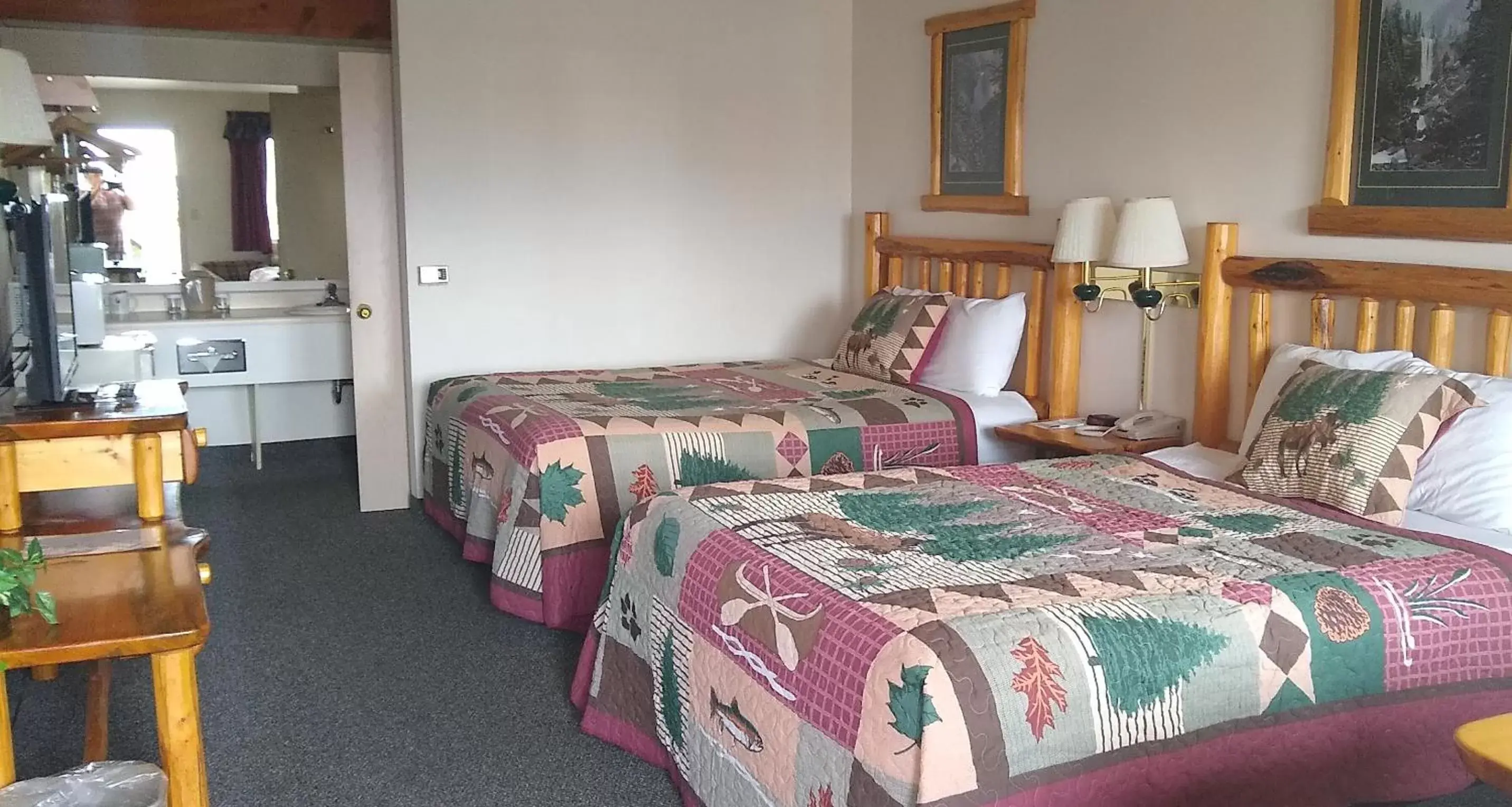 Bed in Ponderosa Motel