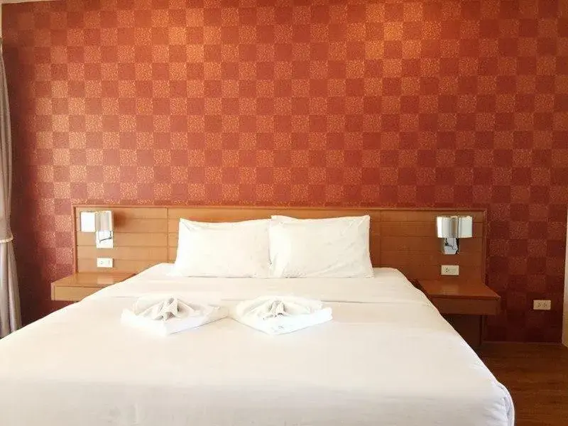 Property building, Bed in Palmari Boutique Hotel
