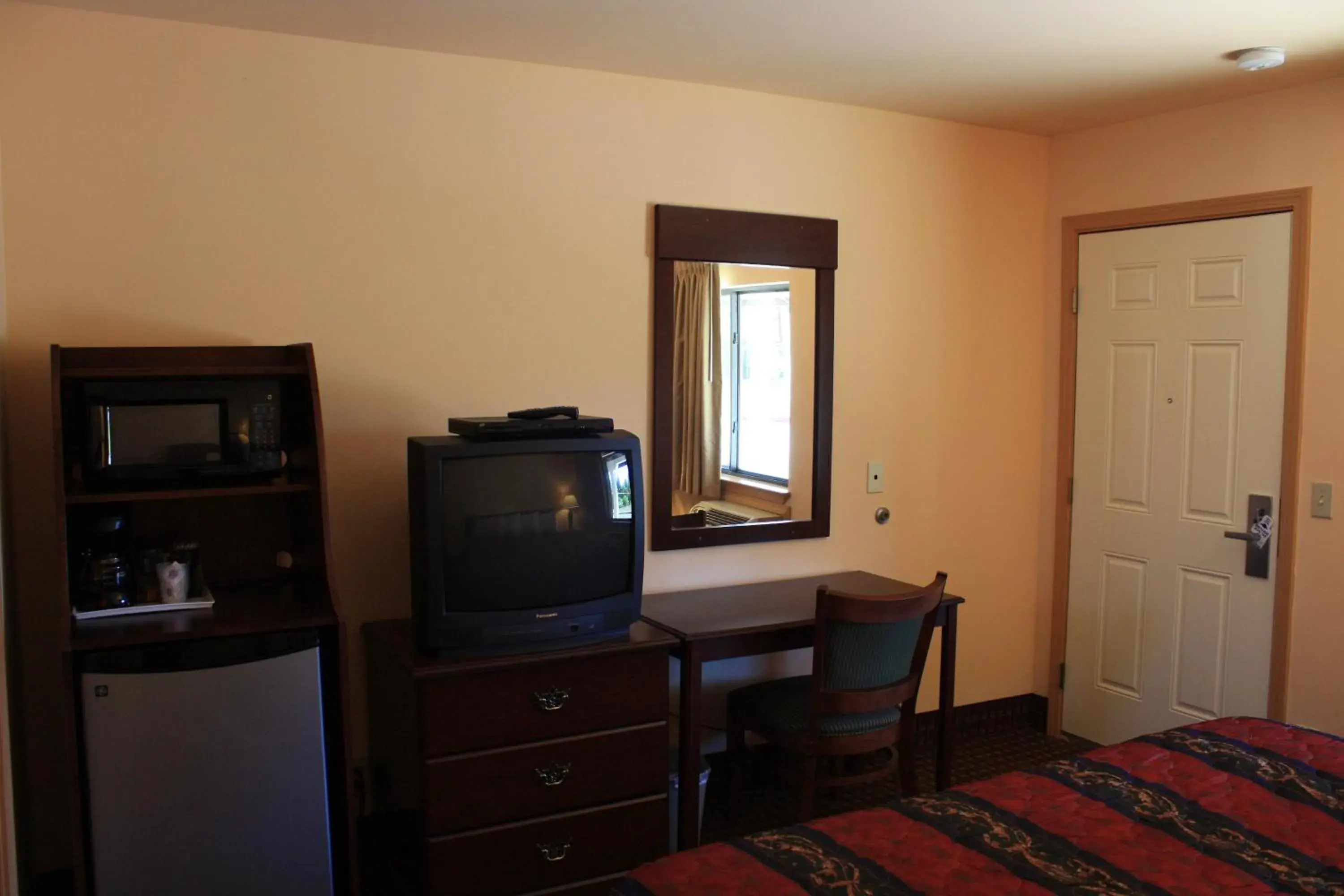 TV and multimedia, TV/Entertainment Center in Gold Trail Motor Lodge