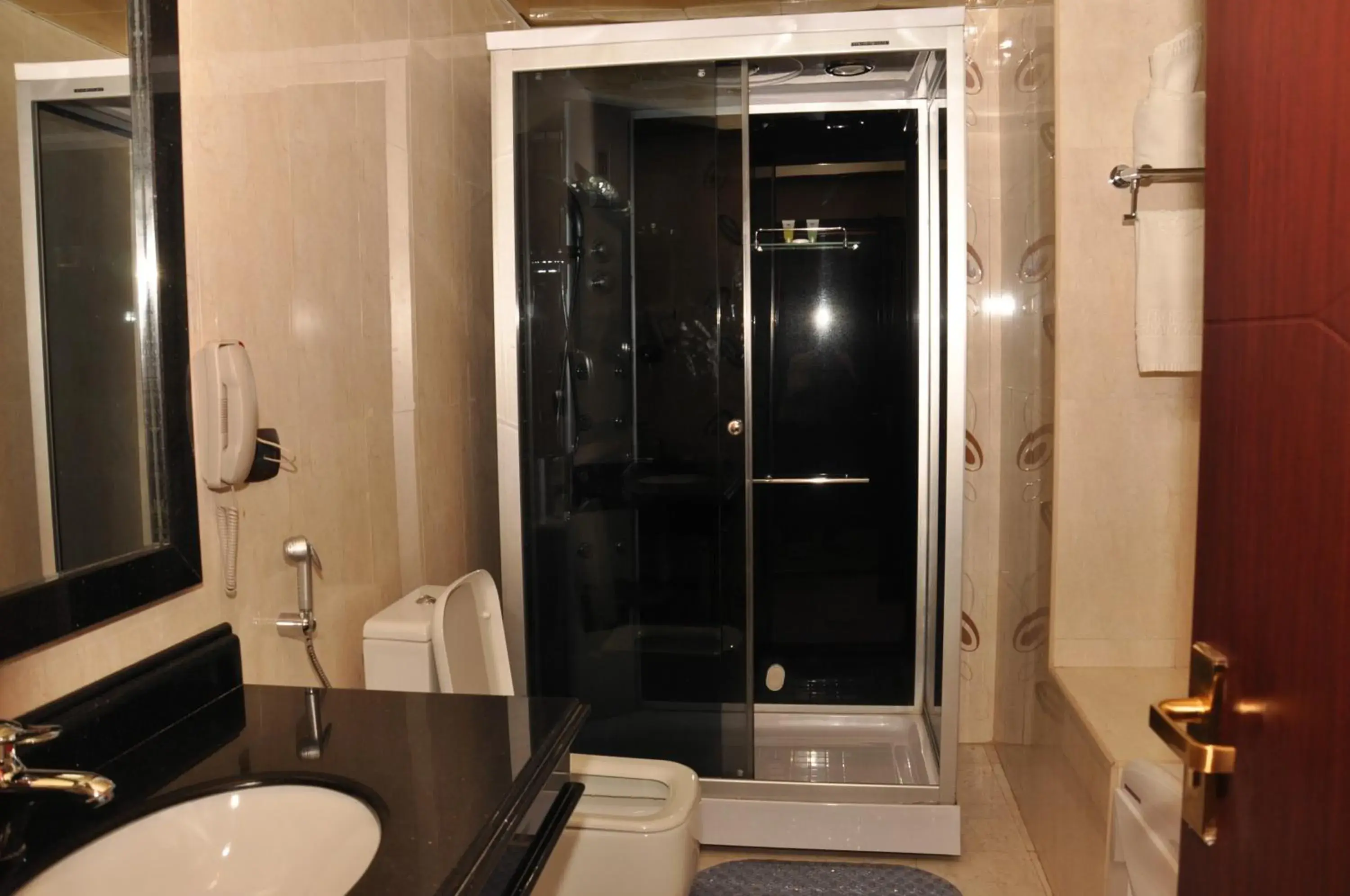 Bedroom, Bathroom in Friendship International Hotel