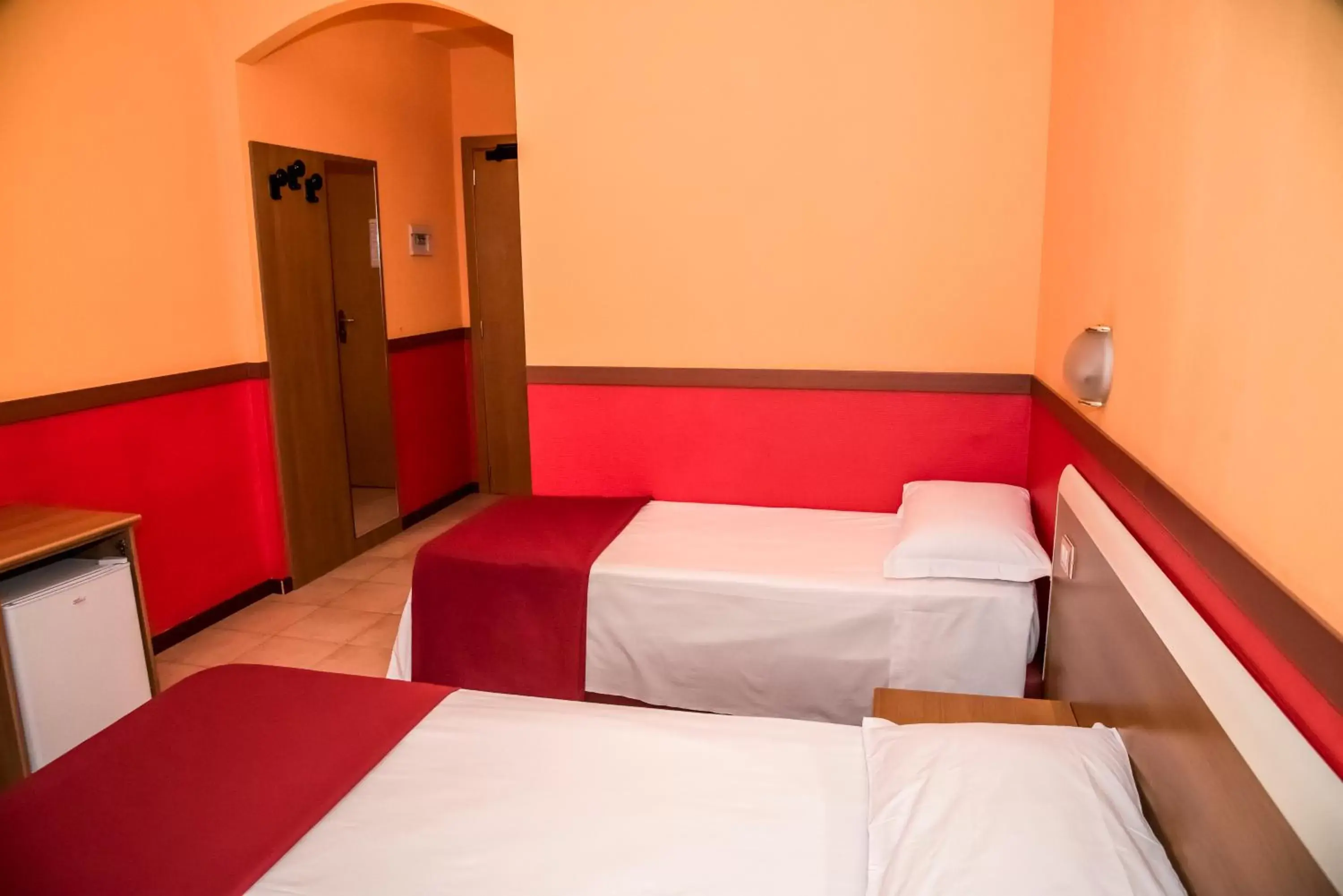 Bed in Hotel Corallo