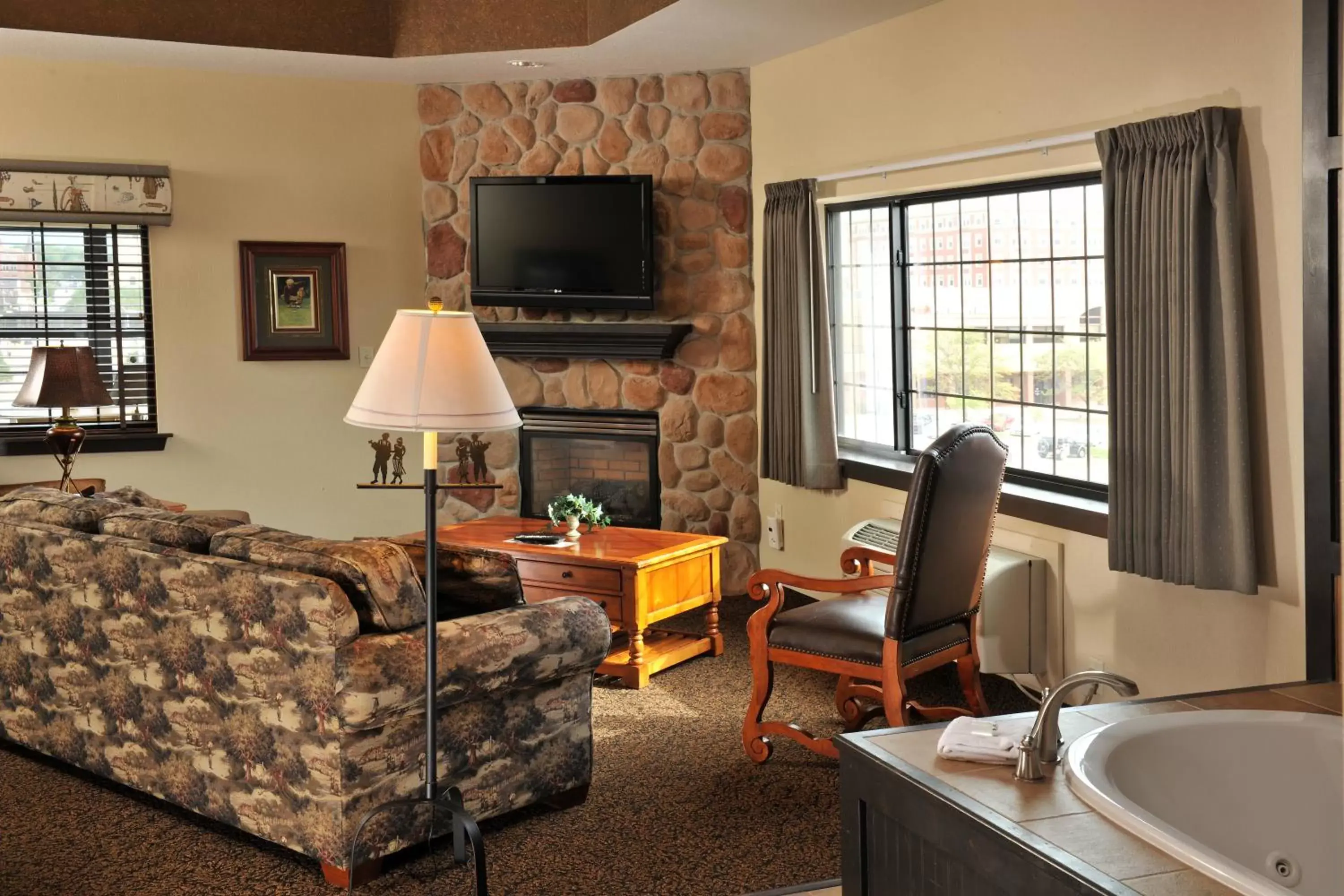 Day, TV/Entertainment Center in Stoney Creek Hotel Sioux City