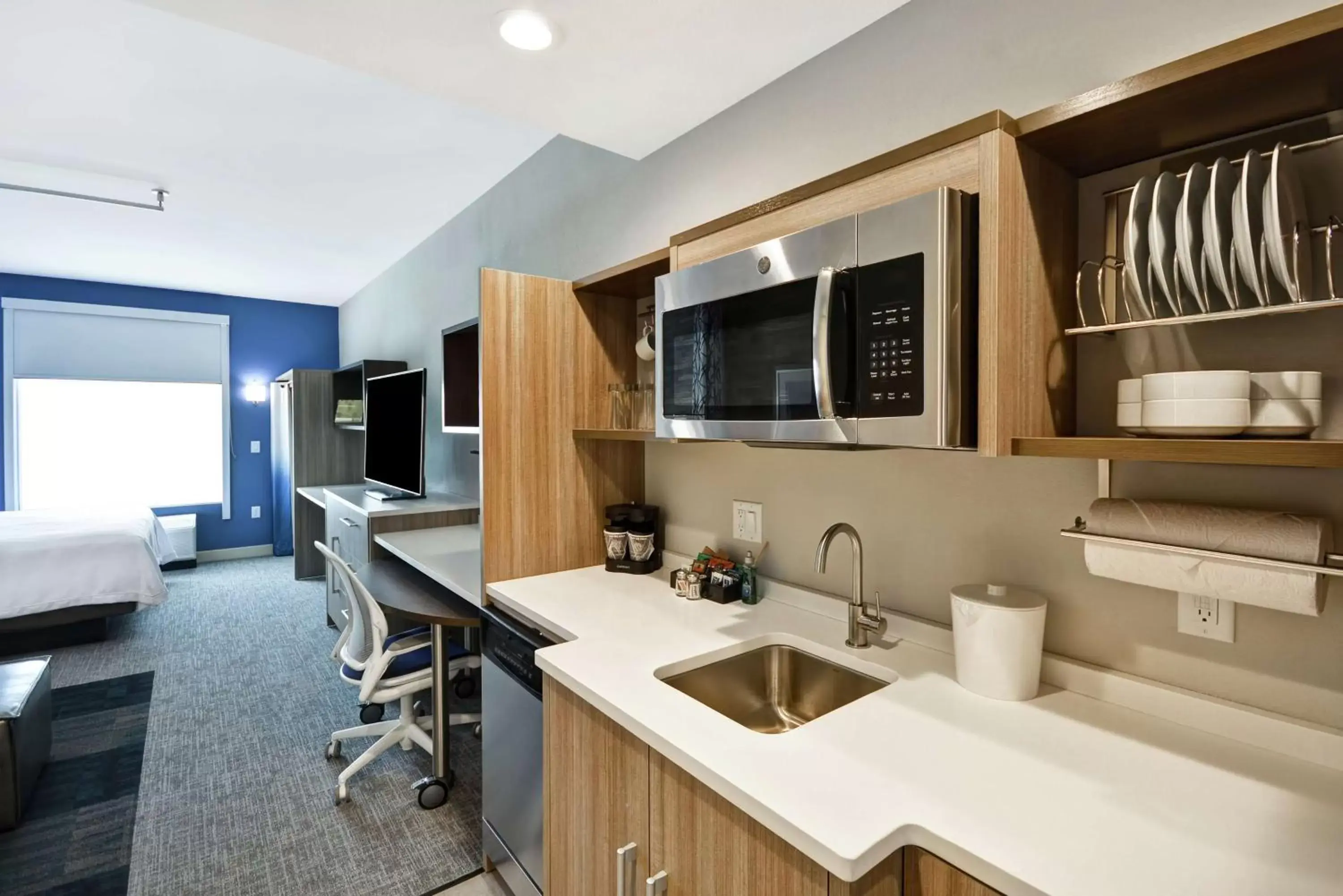 Bedroom, Kitchen/Kitchenette in Home2 Suites Houston Westchase
