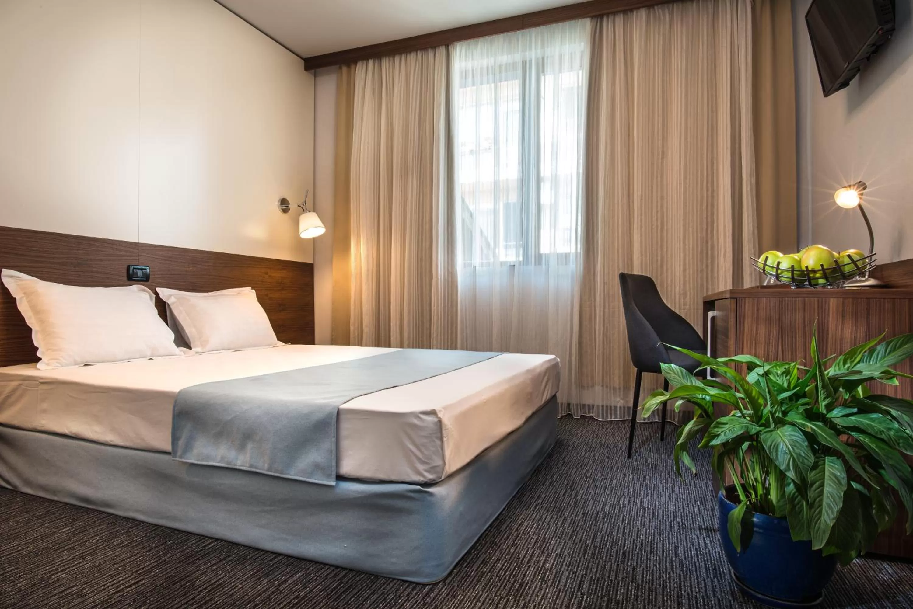 Photo of the whole room, Bed in Uniqato Hotel