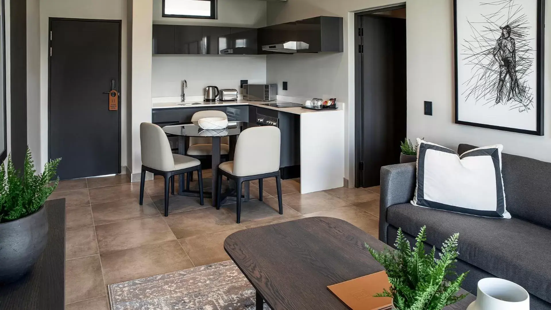 Coffee/tea facilities, Dining Area in The Catalyst Apartment Hotel by NEWMARK