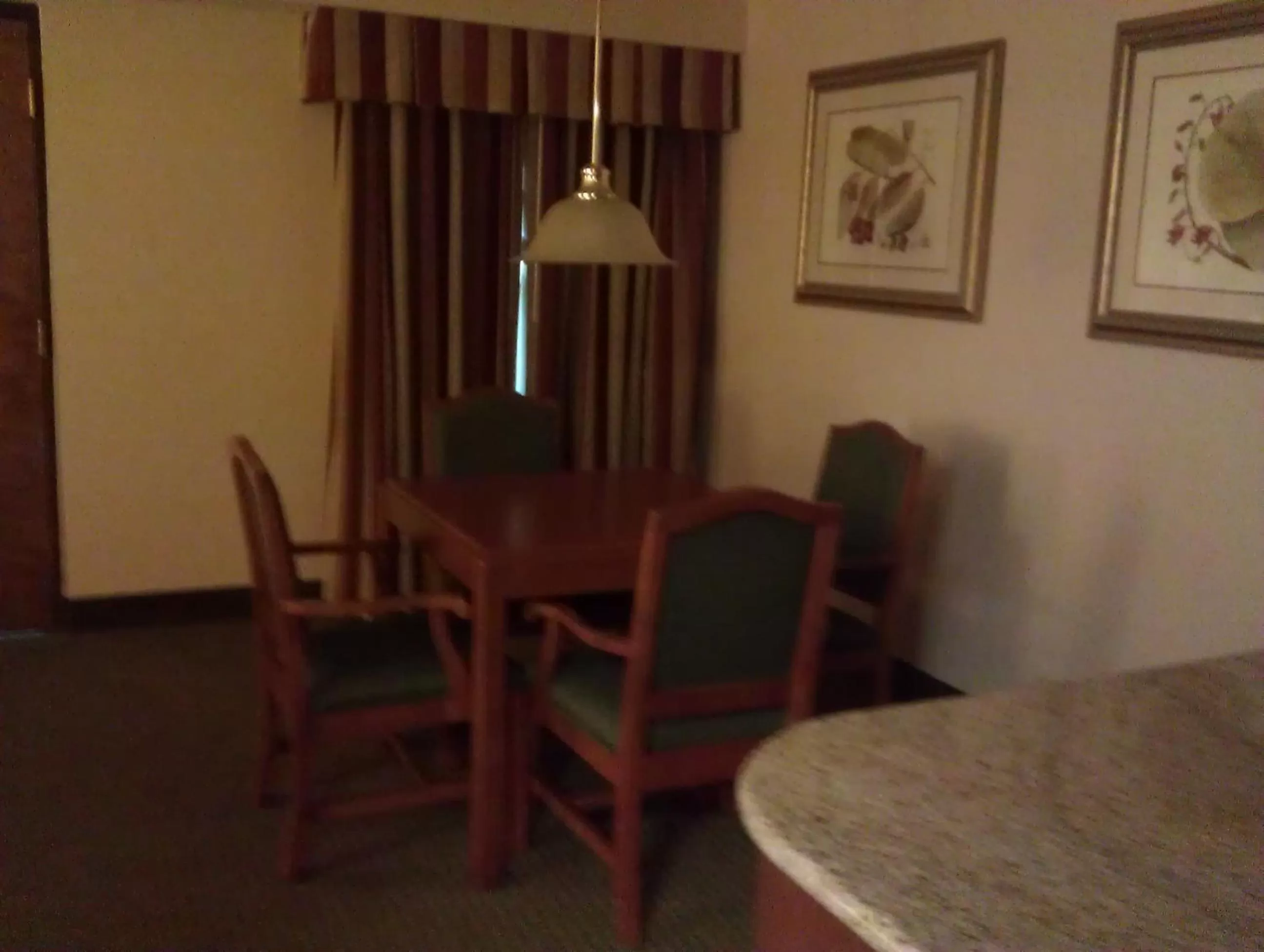 Dining area in AmericInn by Wyndham Omaha