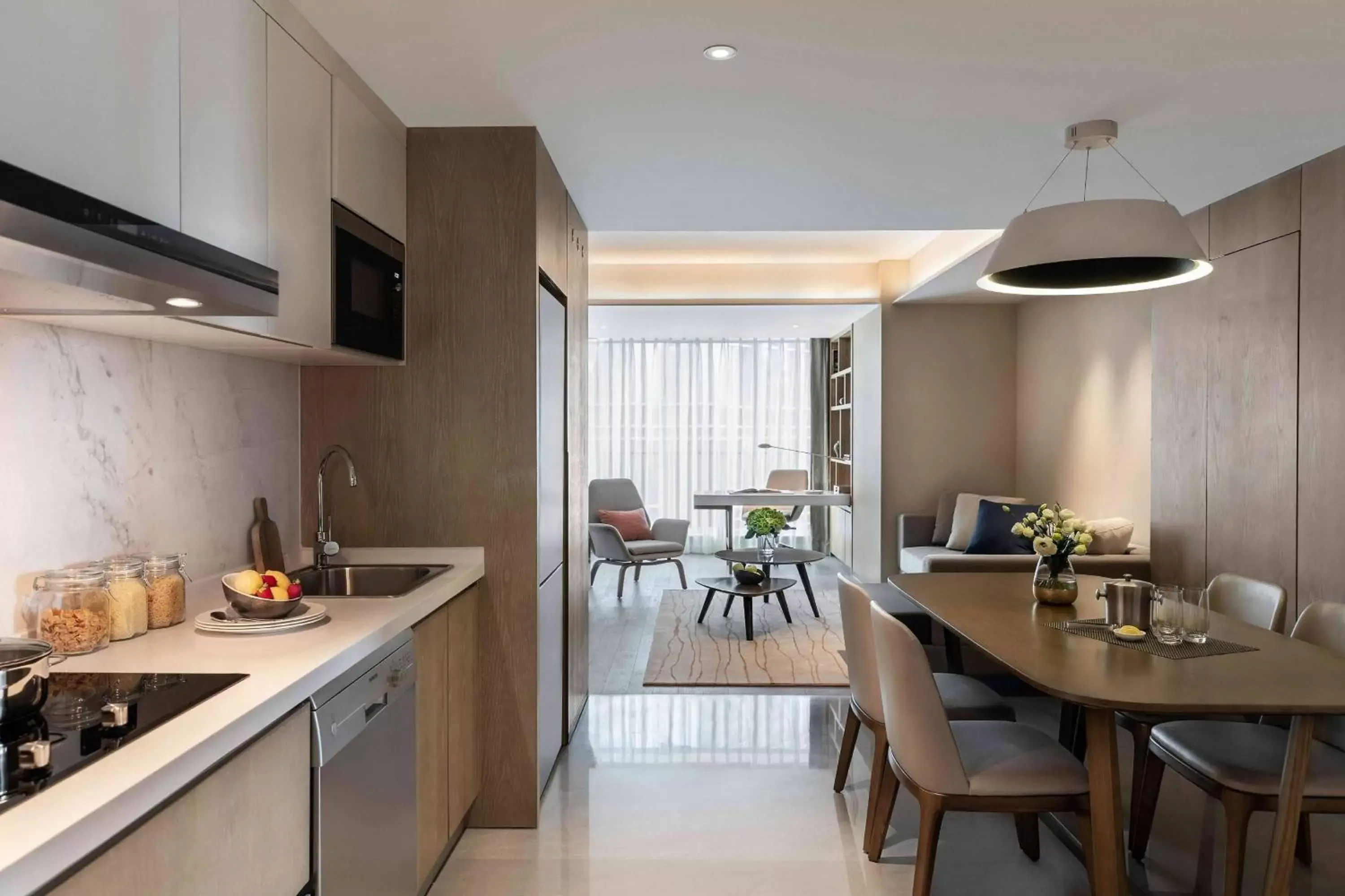 Living room, Kitchen/Kitchenette in Marriott Executive Apartments Chongqing