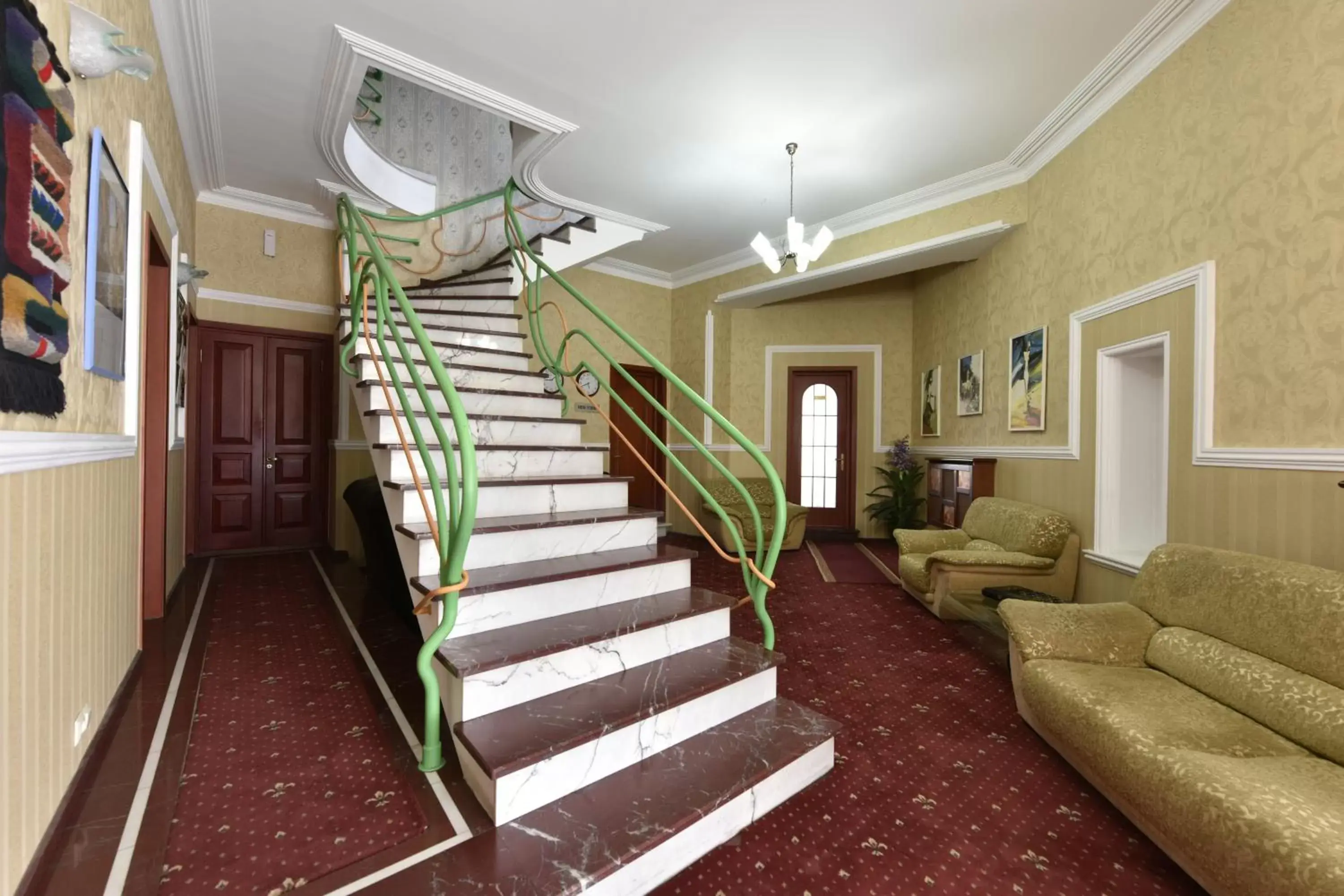 Communal lounge/ TV room, Lobby/Reception in Irmeni Hotel