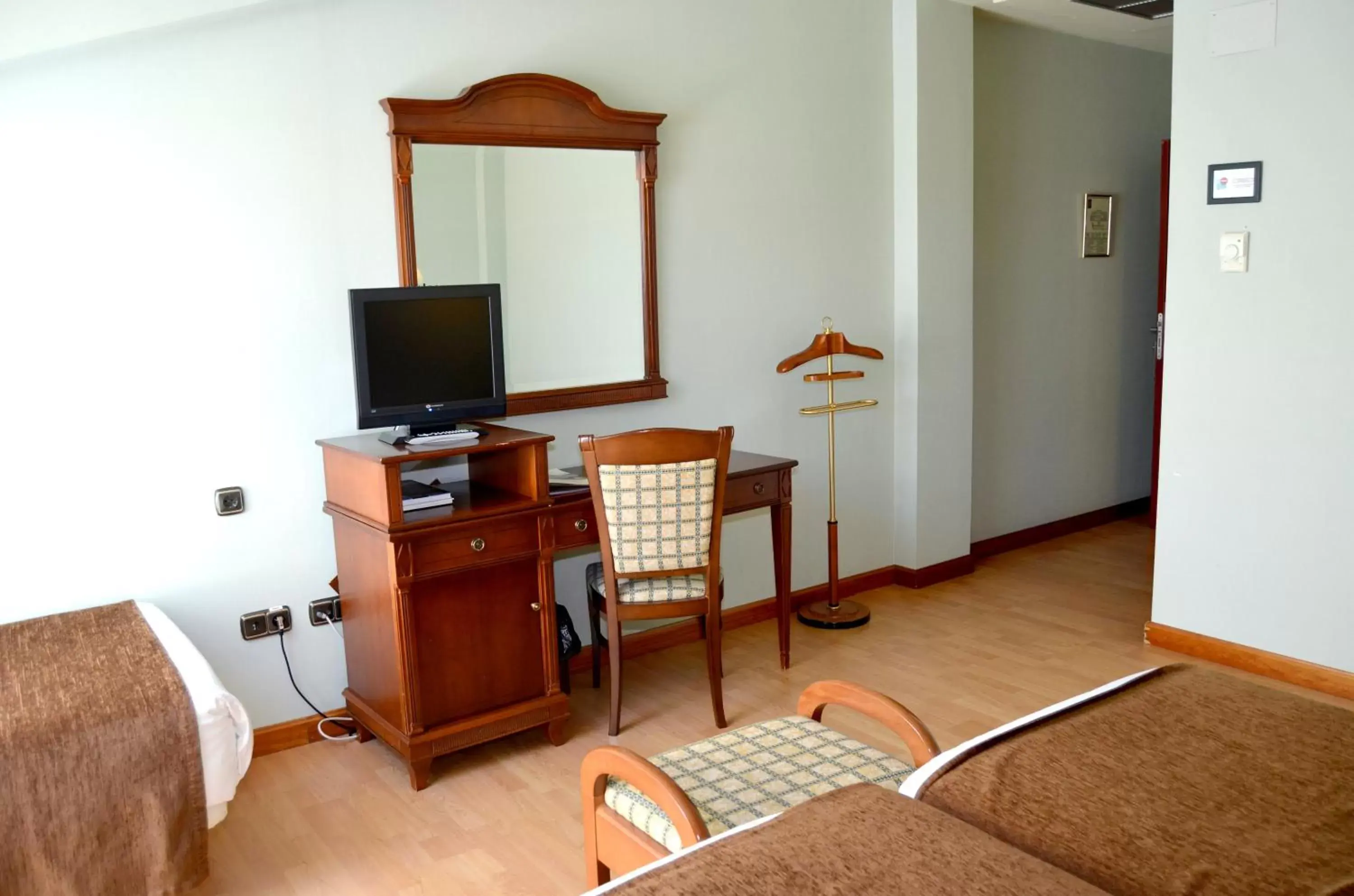 Photo of the whole room, TV/Entertainment Center in Hotel Lasa Sport