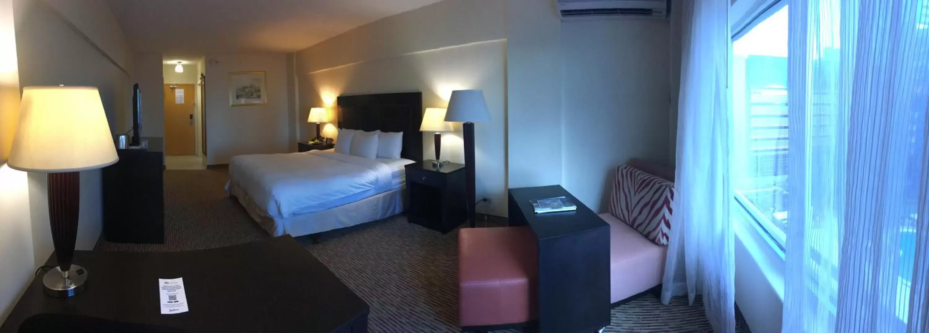 Photo of the whole room, Bed in Radisson Hotel Trinidad