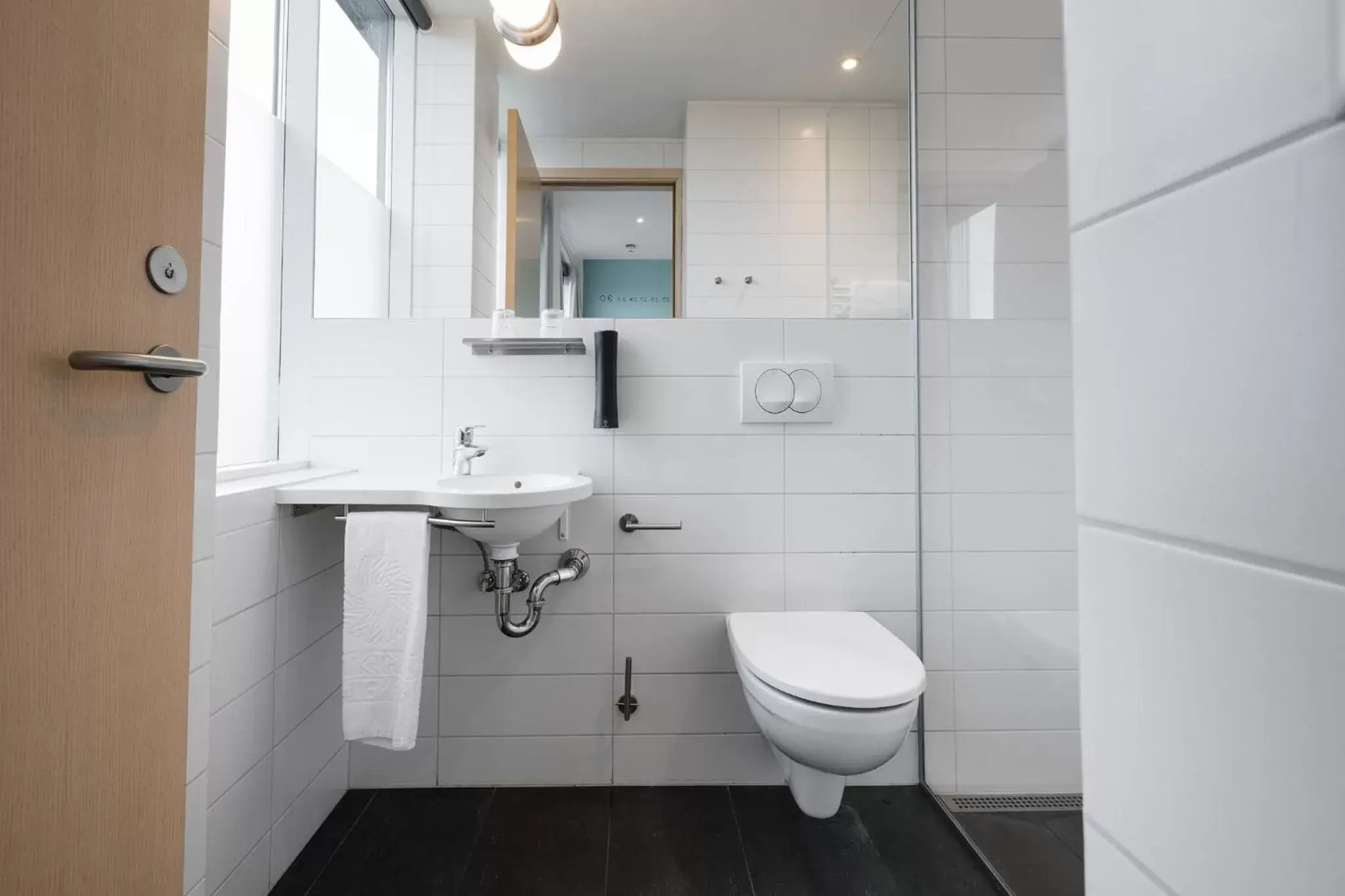Toilet, Bathroom in Reykjavik Lights Hotel by Keahotels