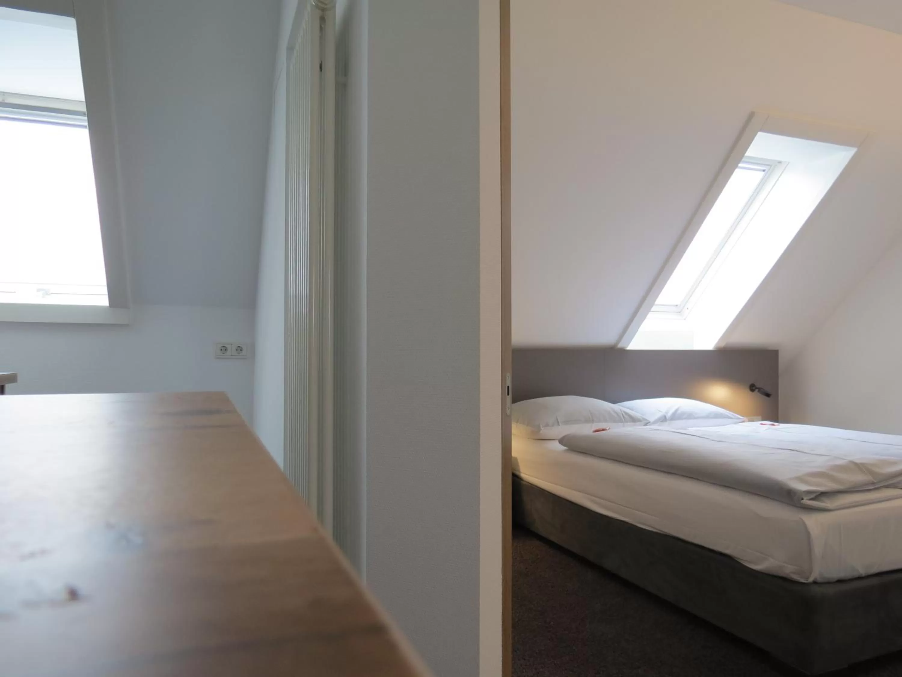 Bed in Comfor Hotel Ulm City