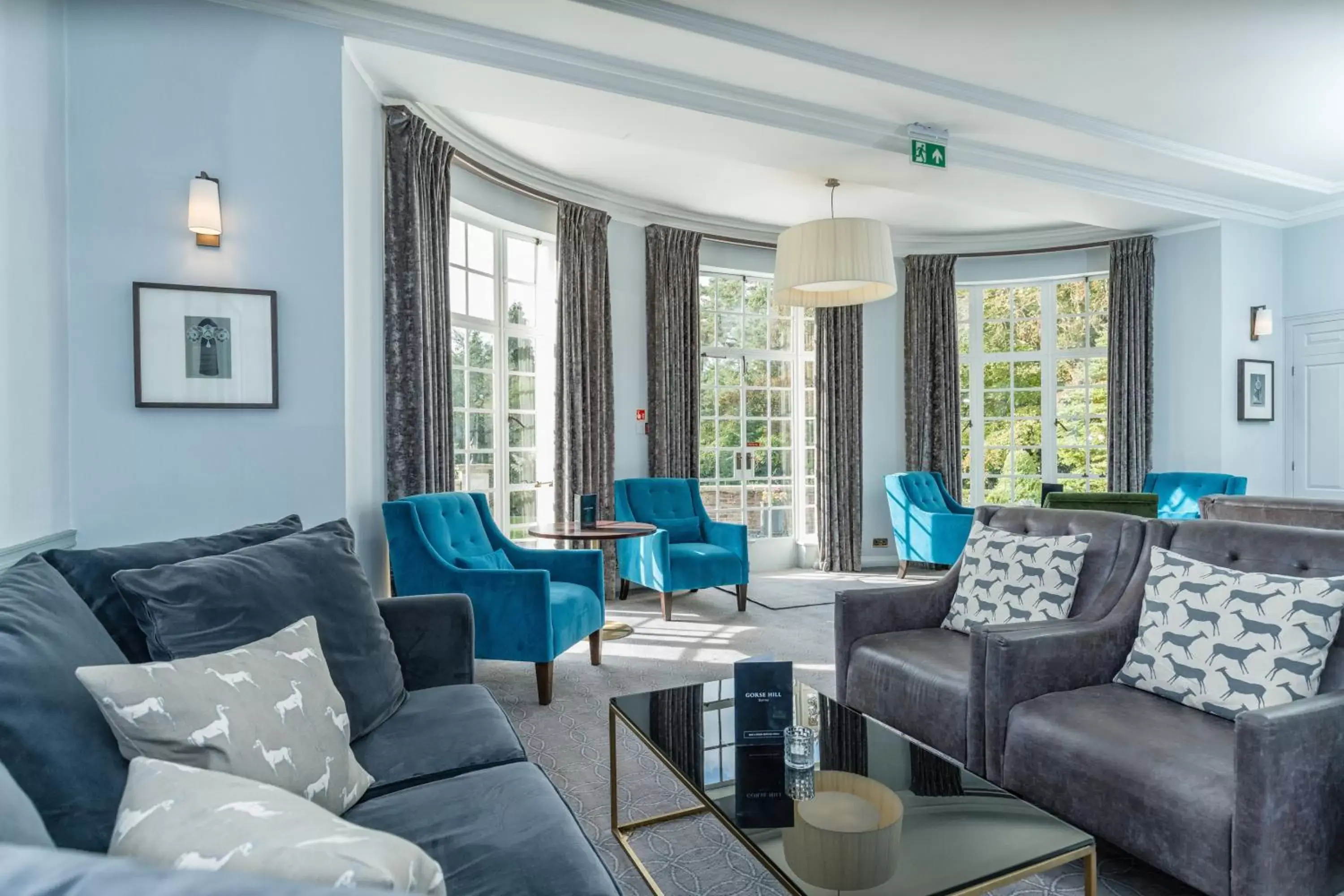 Communal lounge/ TV room, Seating Area in Gorse Hill Hotel