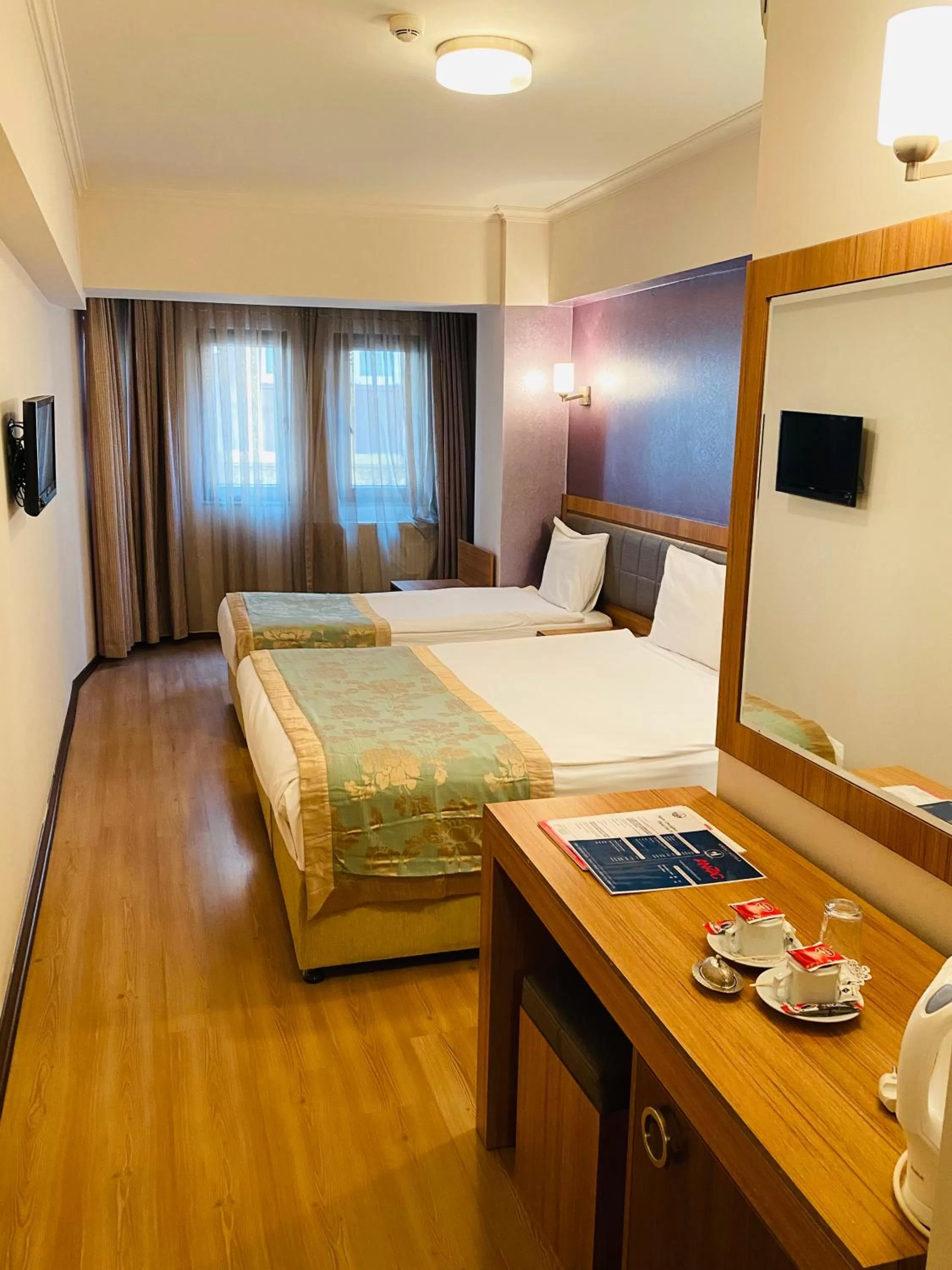 Bed in Grand Anzac Hotel