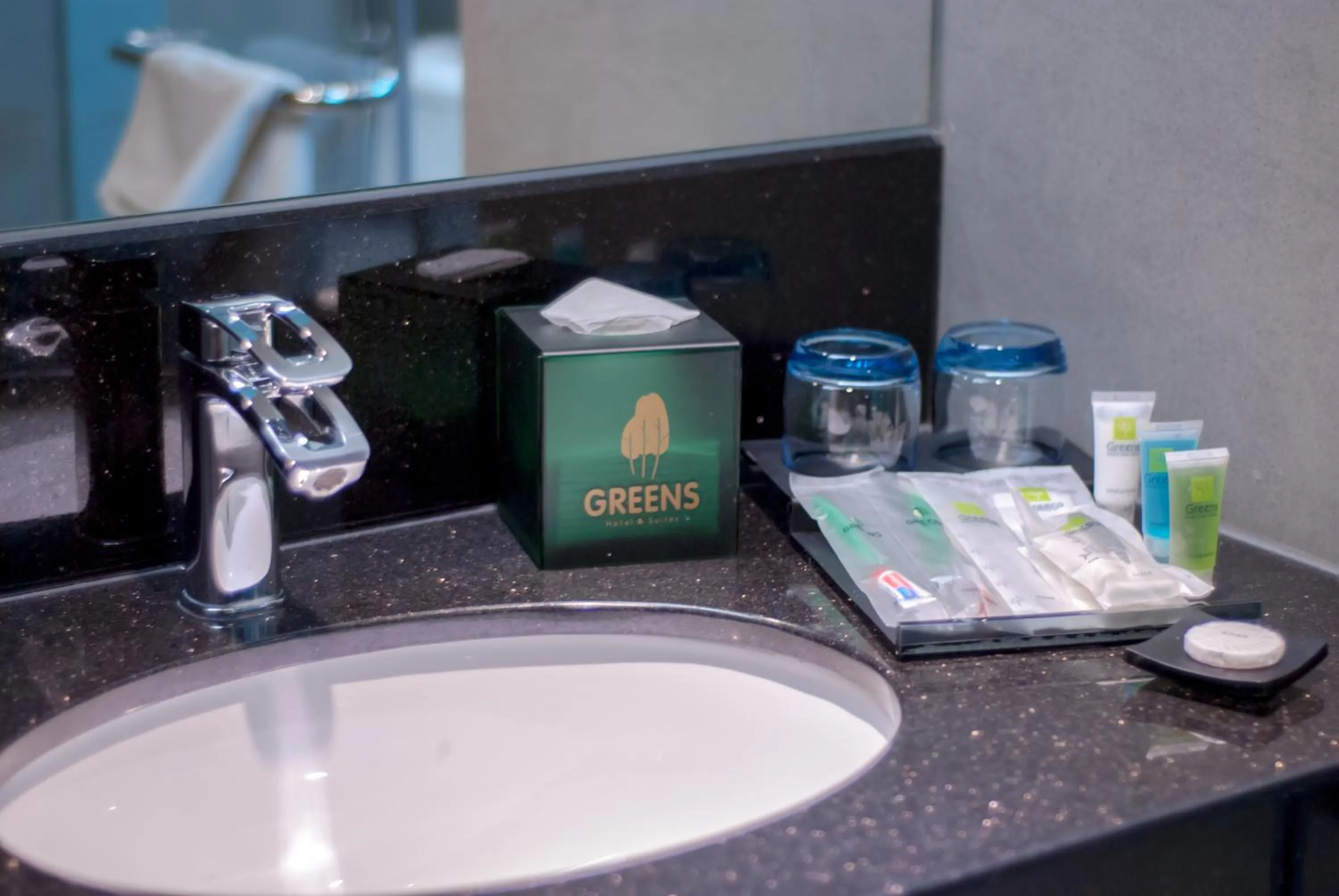 Bathroom in Greens Hotel & Suites