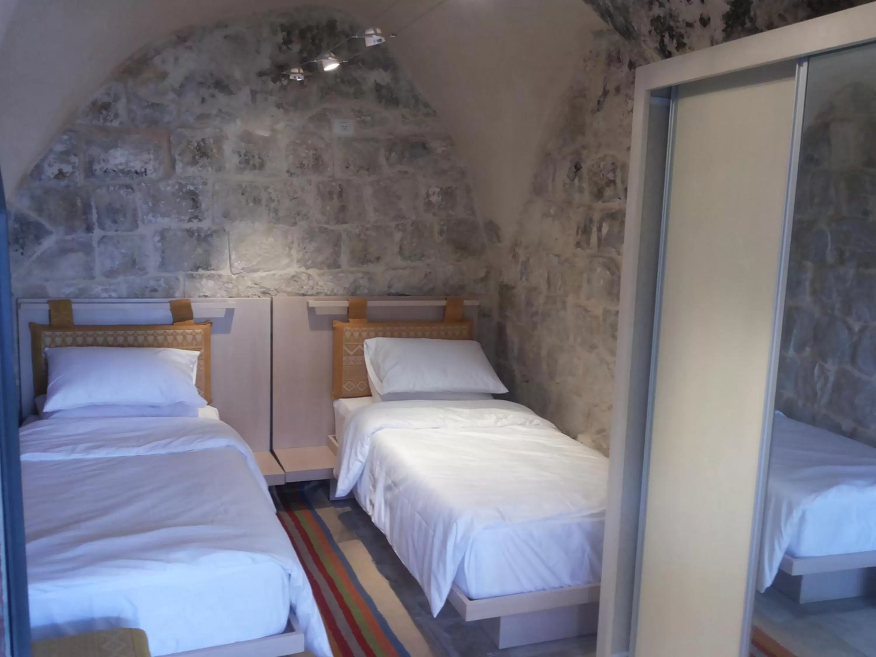 Bed in Khan Alwakala Hotel