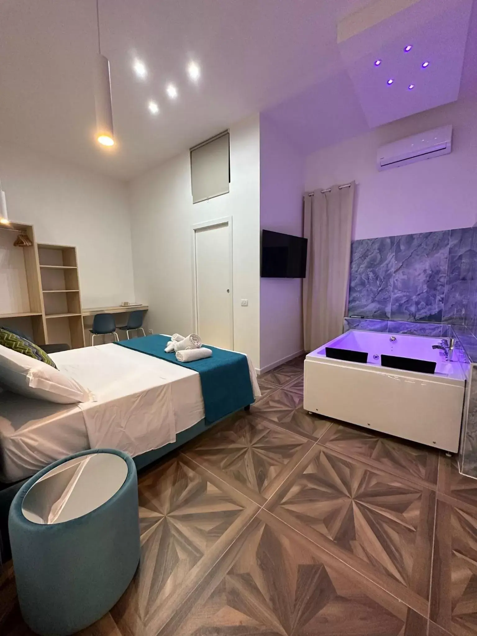 Bed in San Ferdinando suite room
