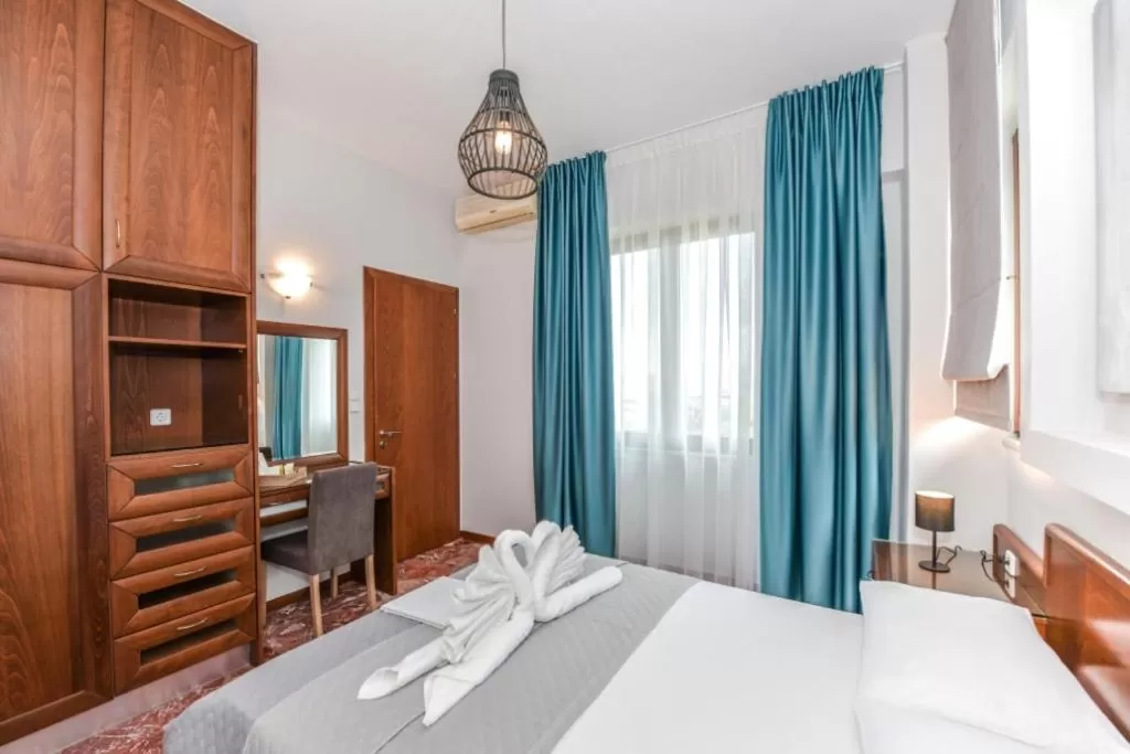 Bedroom in V & G Cozy Apartments