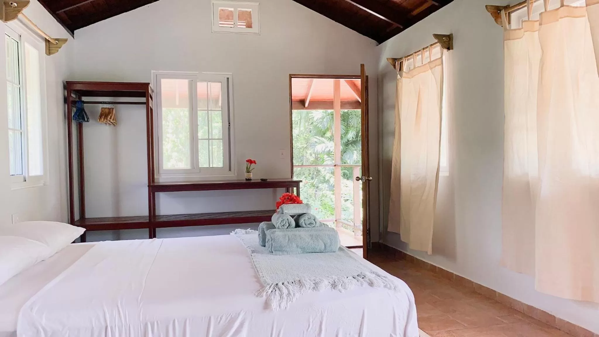 Queen Room with Balcony in Bird Island Bungalows