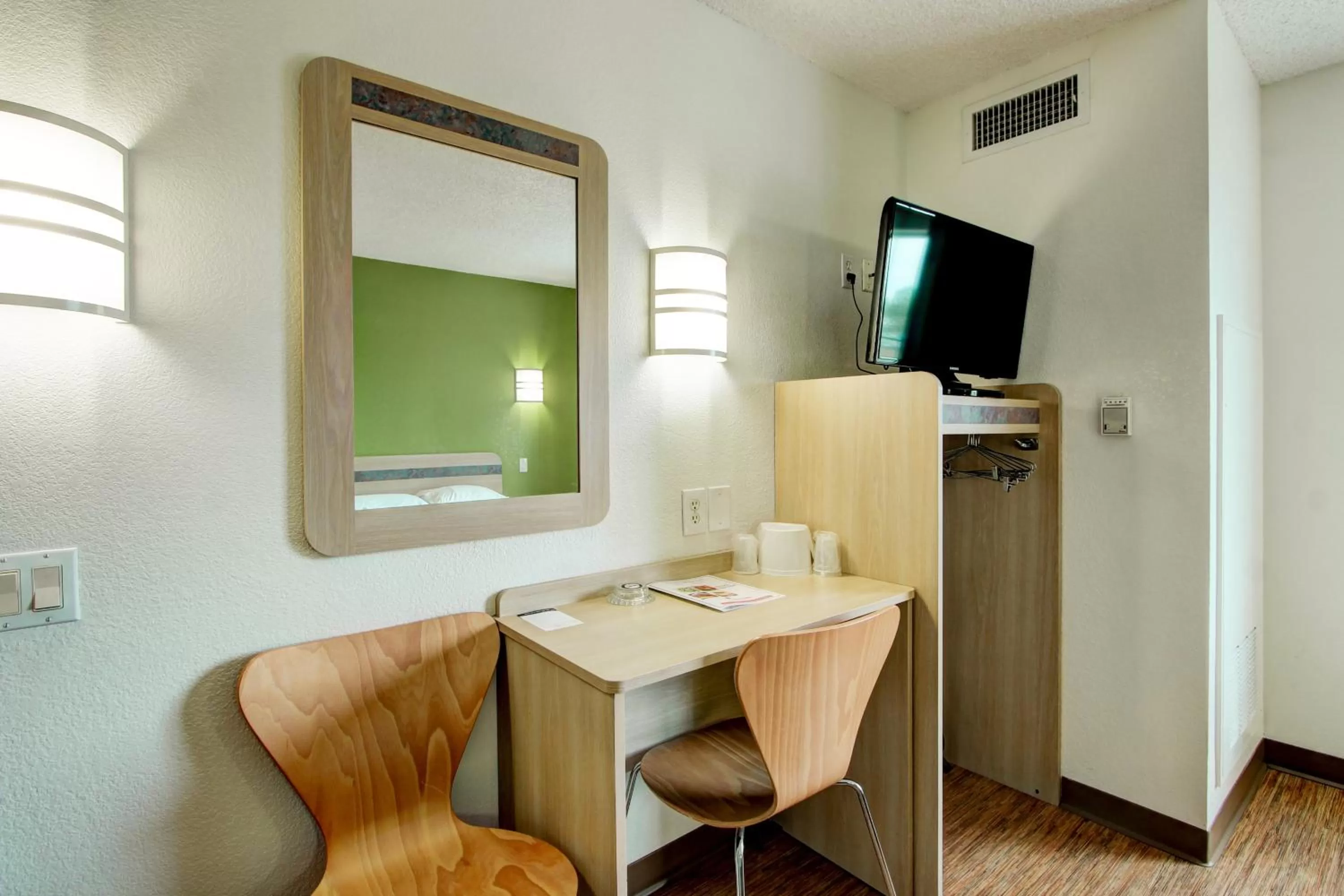 Seating area in Super 8 by Wyndham Aurora East